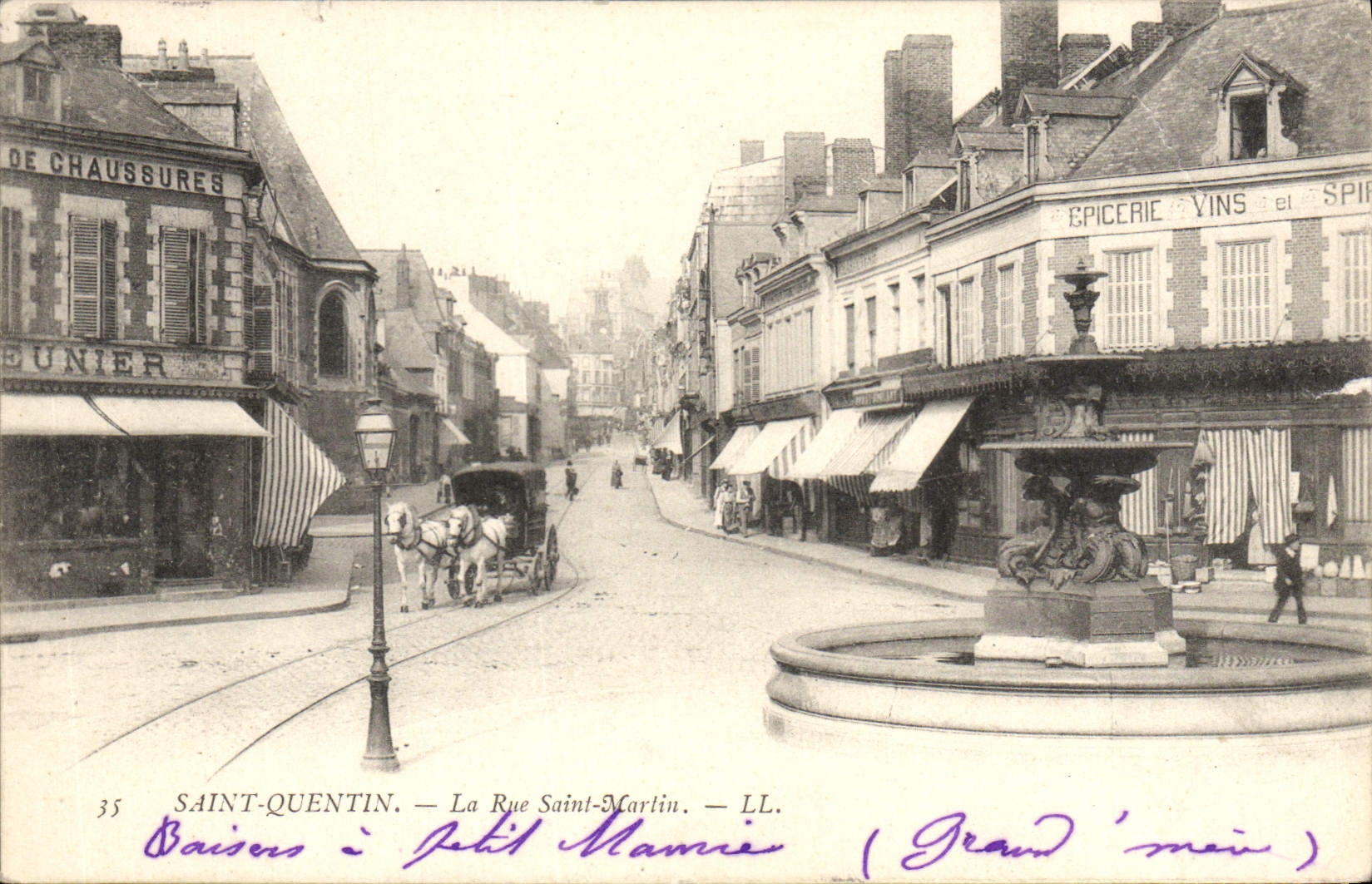 CPA Saint Quentin la rue Saint Martin 