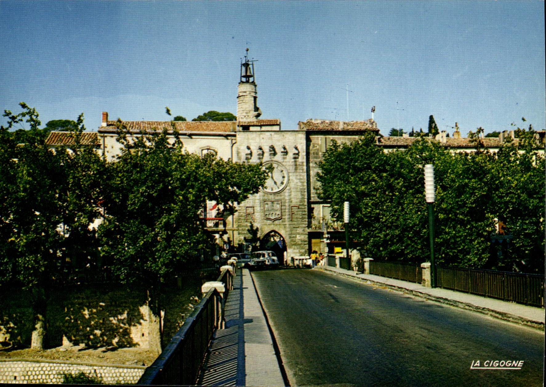 CPSM Sommieres Le Pont Sur Le Virdoule Et La Tour De I'Horloge