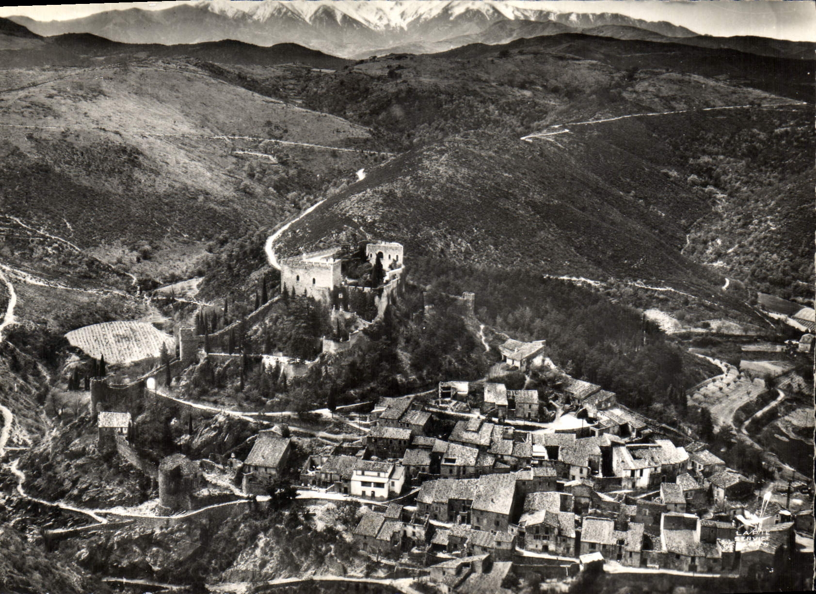 CPSM En Avion au Dessus De Castelnou PO Le Village Xe s Au fond le Canigou 