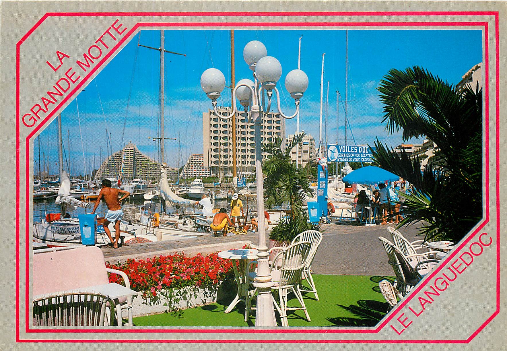 CPSM La Grande Motte La Ville de l'An 2000 Un coin du Port de plaisance a l'arriere plan la Grande P