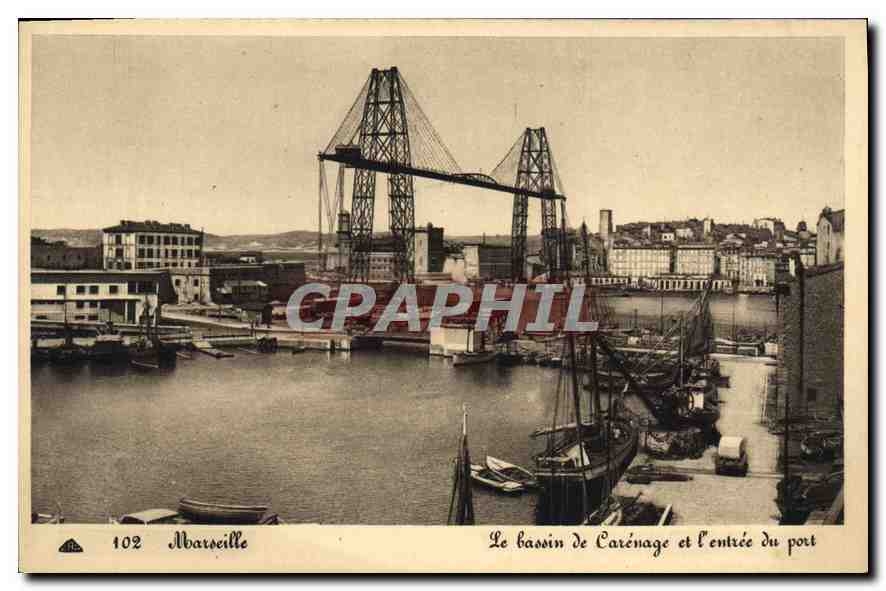 CPA Marseille Une rue du vieux port vers le Fort Saint Jean et le pont transbordeur