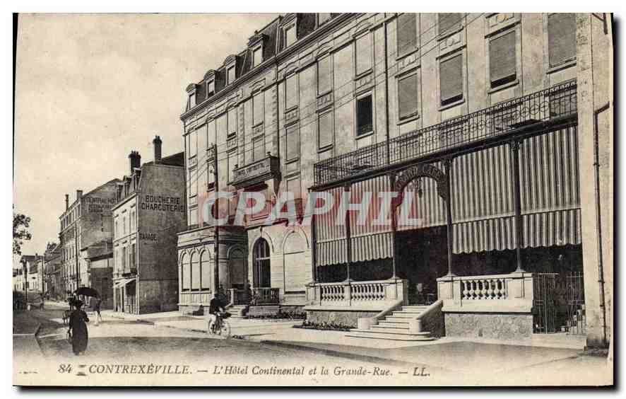CPA Contrexeville L'Hotel Continantal et la Grande Rue