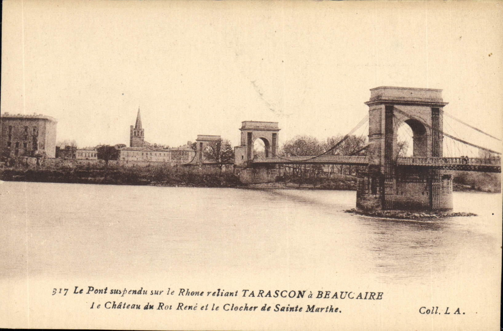 CPA Le Pont supendu sur le Rhone reliant Tarascon a Beaucaire le Chateau du Roi Rene et le Clocher d