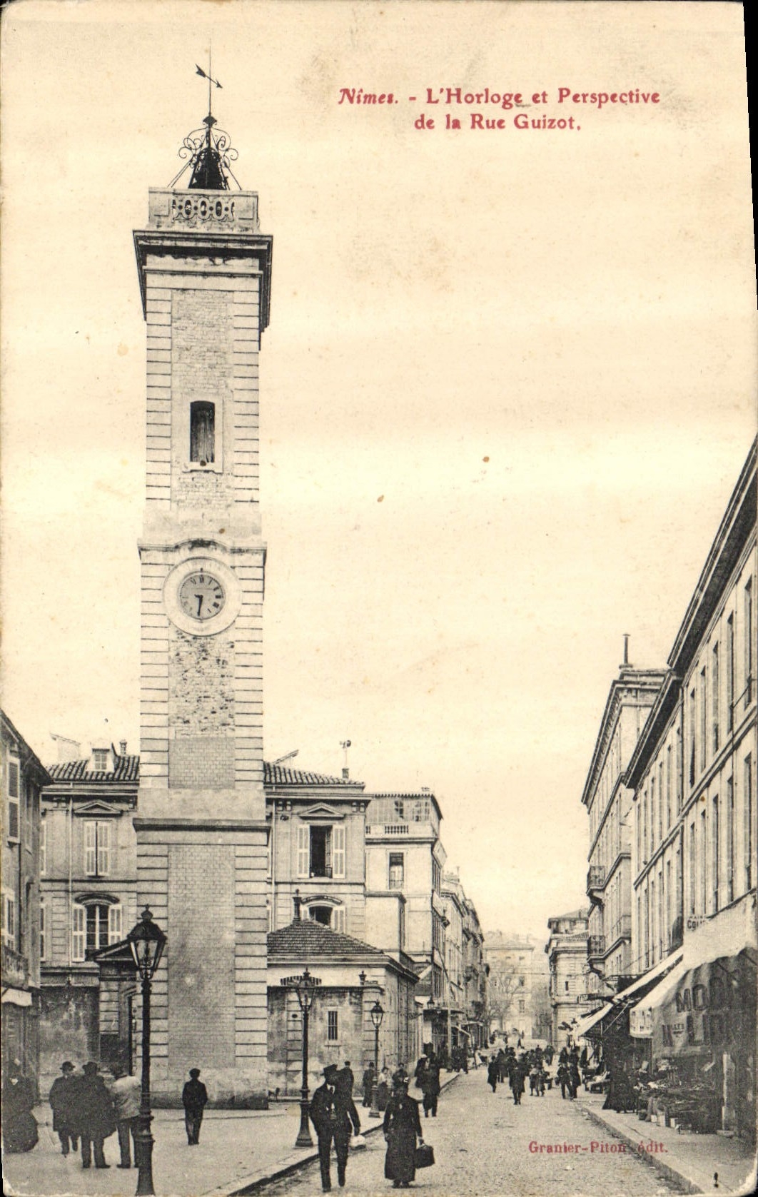 CPA Nimes L'Horloge et Perspective de la Rue Guizot 