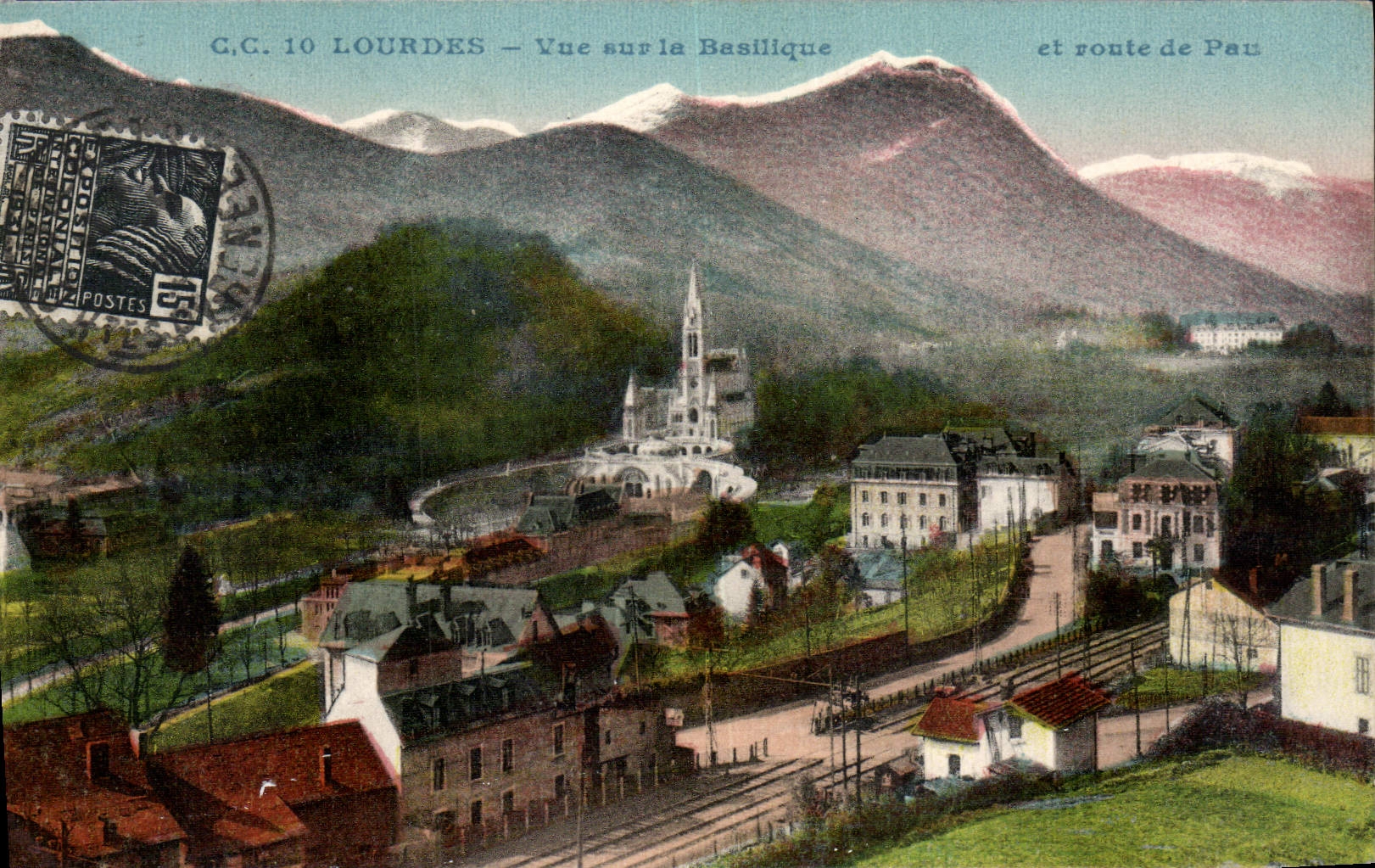 CPA Lourdes Vue sur la Basilique et route de Pau 