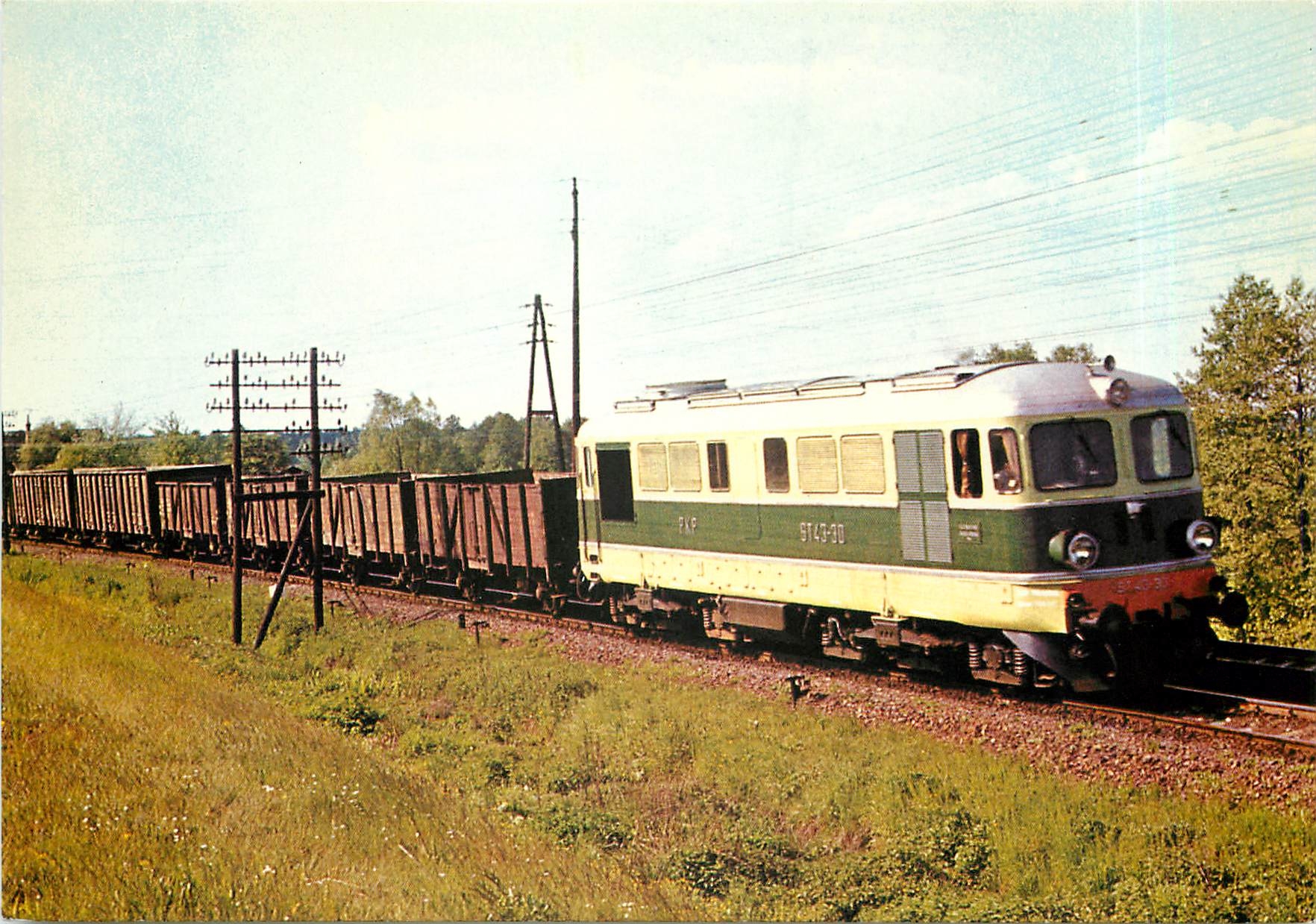 CPM Train de tombereaux vides remorque par un diesel serie TY 43 de la serie Pita - Krysz 08/77