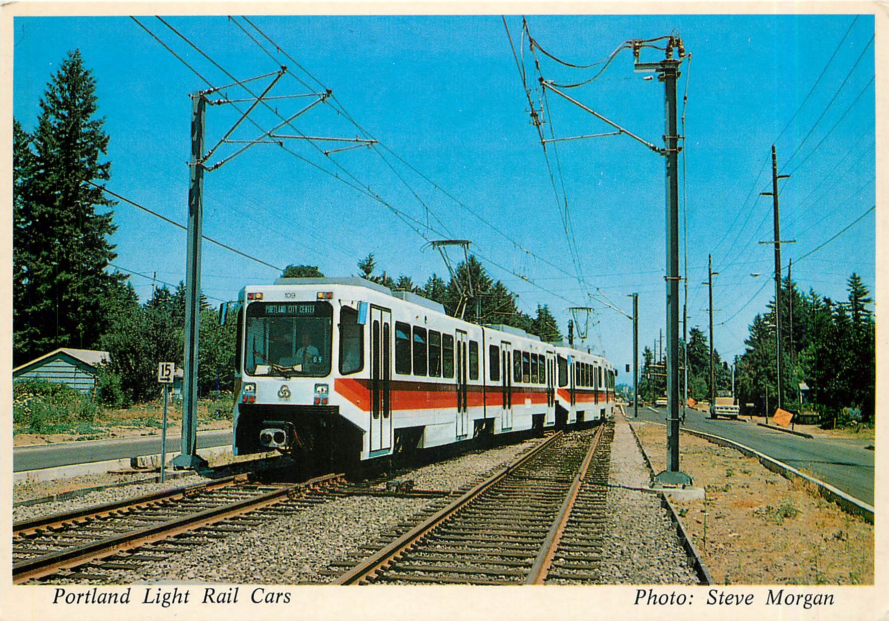 CPM A coupled air of Bombardier built light rail cars uses the crossover on E Burnside St ave