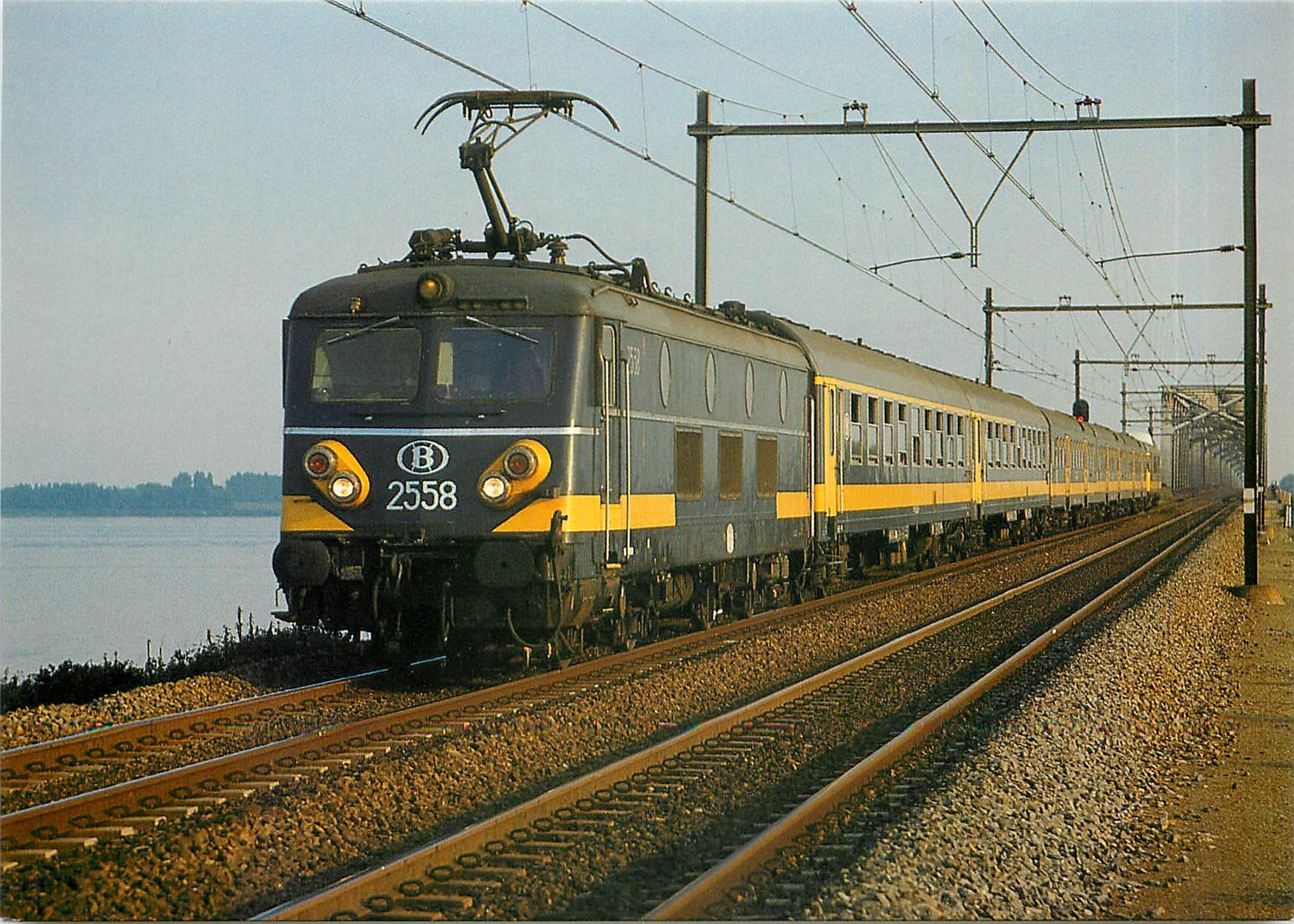 CPM Locomotive 2558 heading passenger train near Hollands Diep 