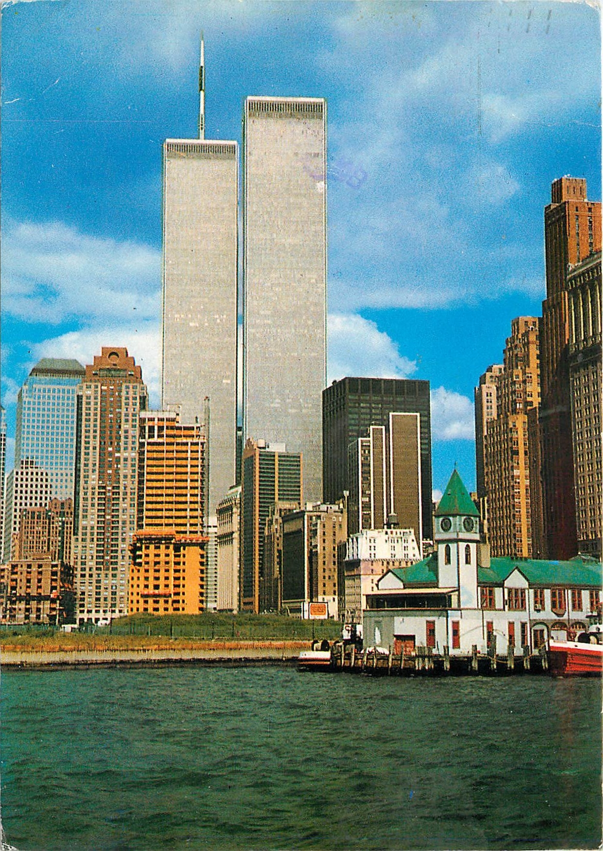 CPM The Twin Towers of the World Trade Center with Battery Park City in the foreground New York City