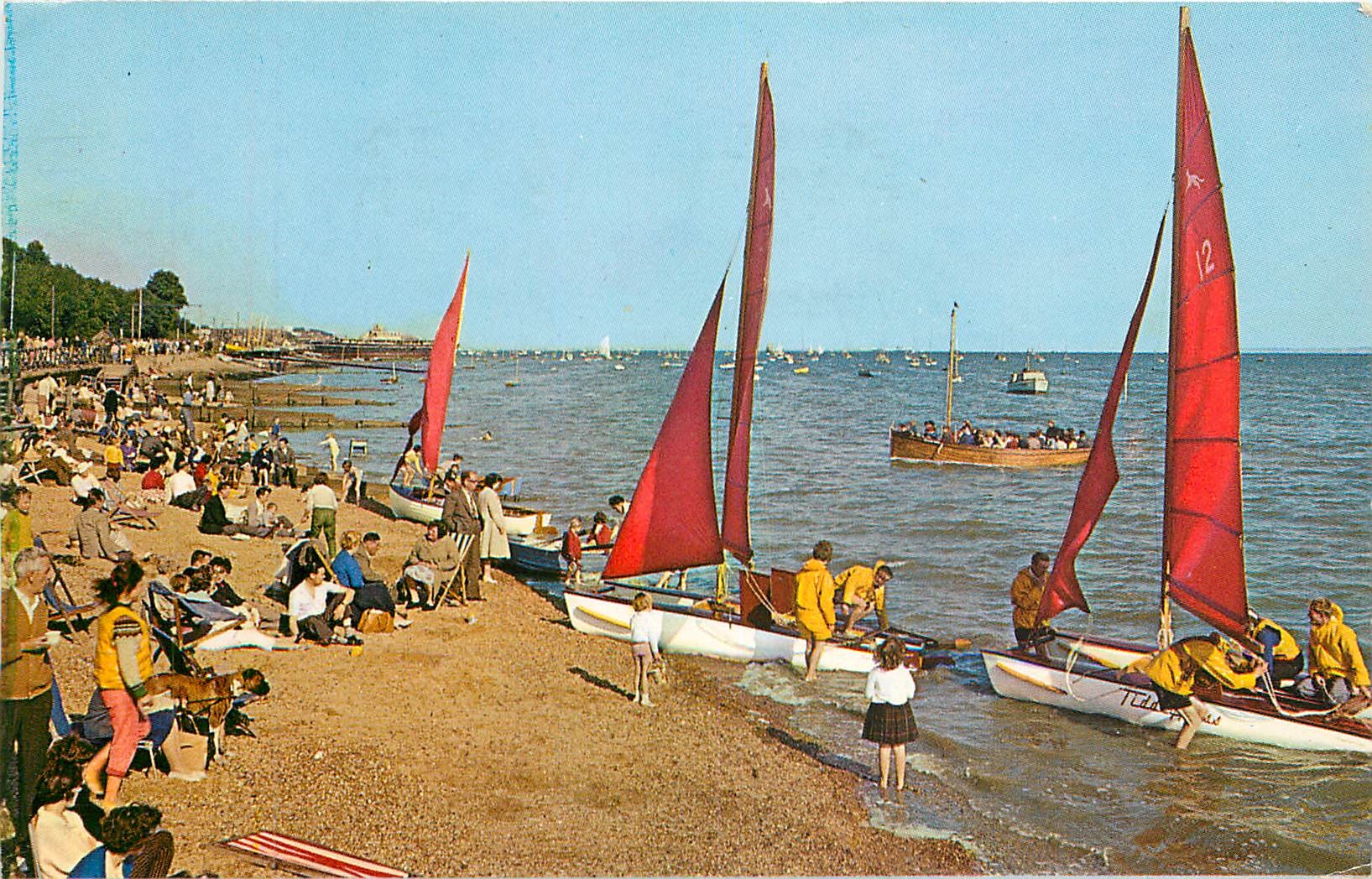 CPM Leigh On Sea Catamaran Sailing boats prepare to leave the beach at Leigh near Bell Wharf Bateaux
