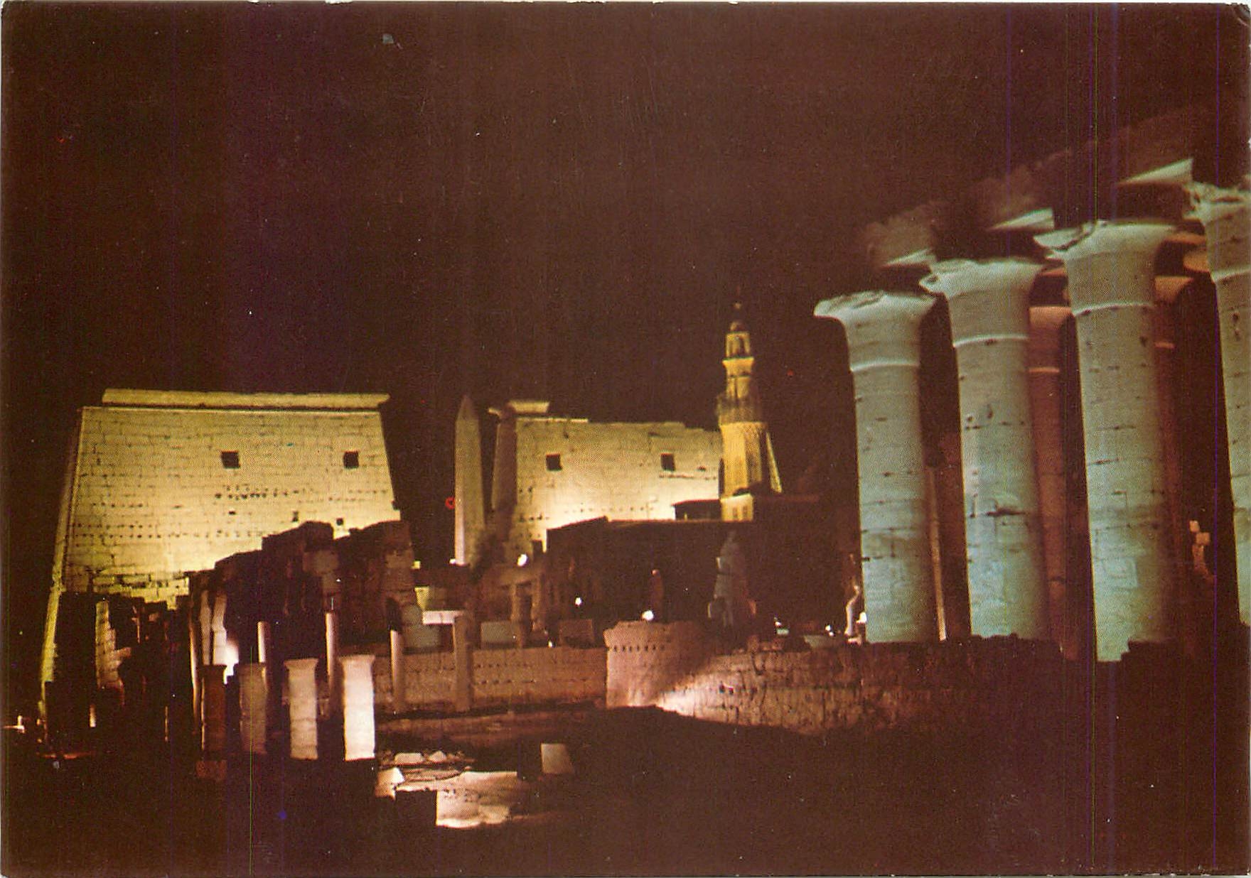 CPM Luxor Temple Pylon and Obelisk of Ramses II illuminated by night 