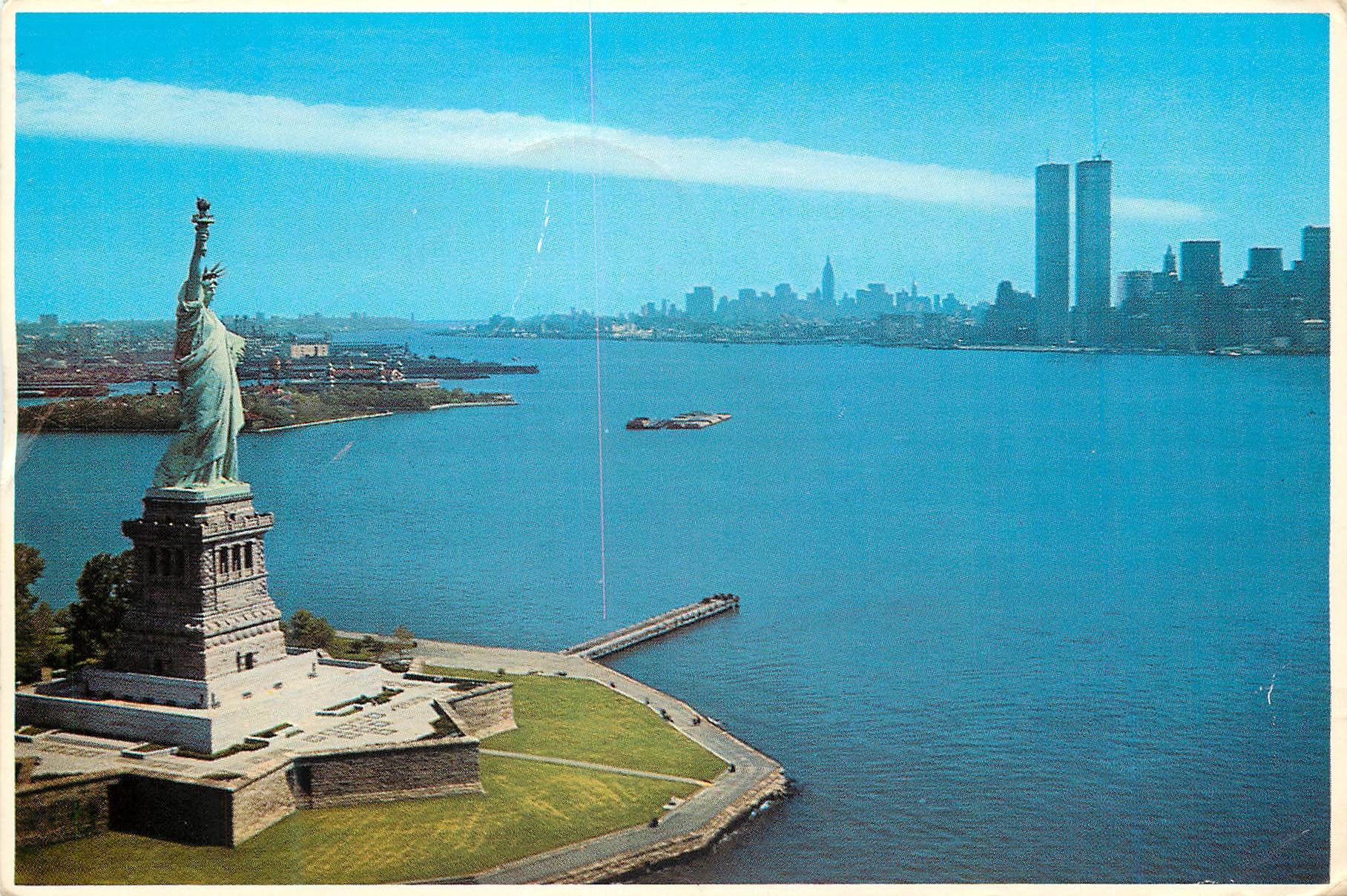 CPM New York City The Statue of Liberty with the lower Manhattan skyline in the background