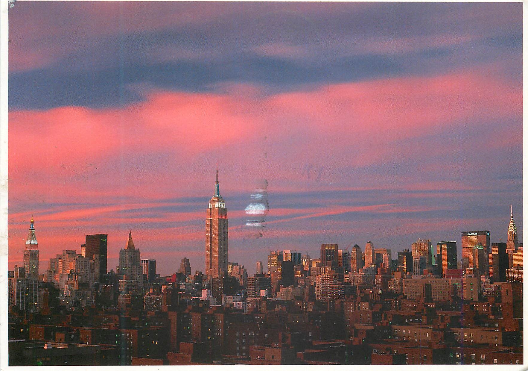 CPM New York A Brilliant Sunset Sky Frames the empire state building