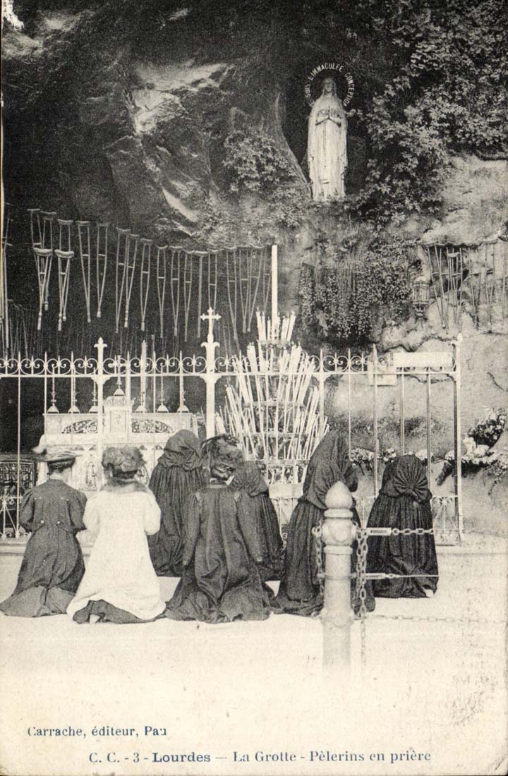 Lourdes CPA the cave Pilgrims in prayer