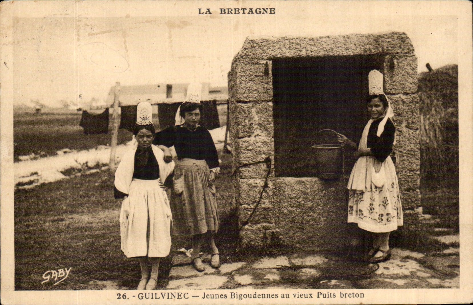 Young Guilvinec CPA bigoudennes with the old Breton well (folklore caps)