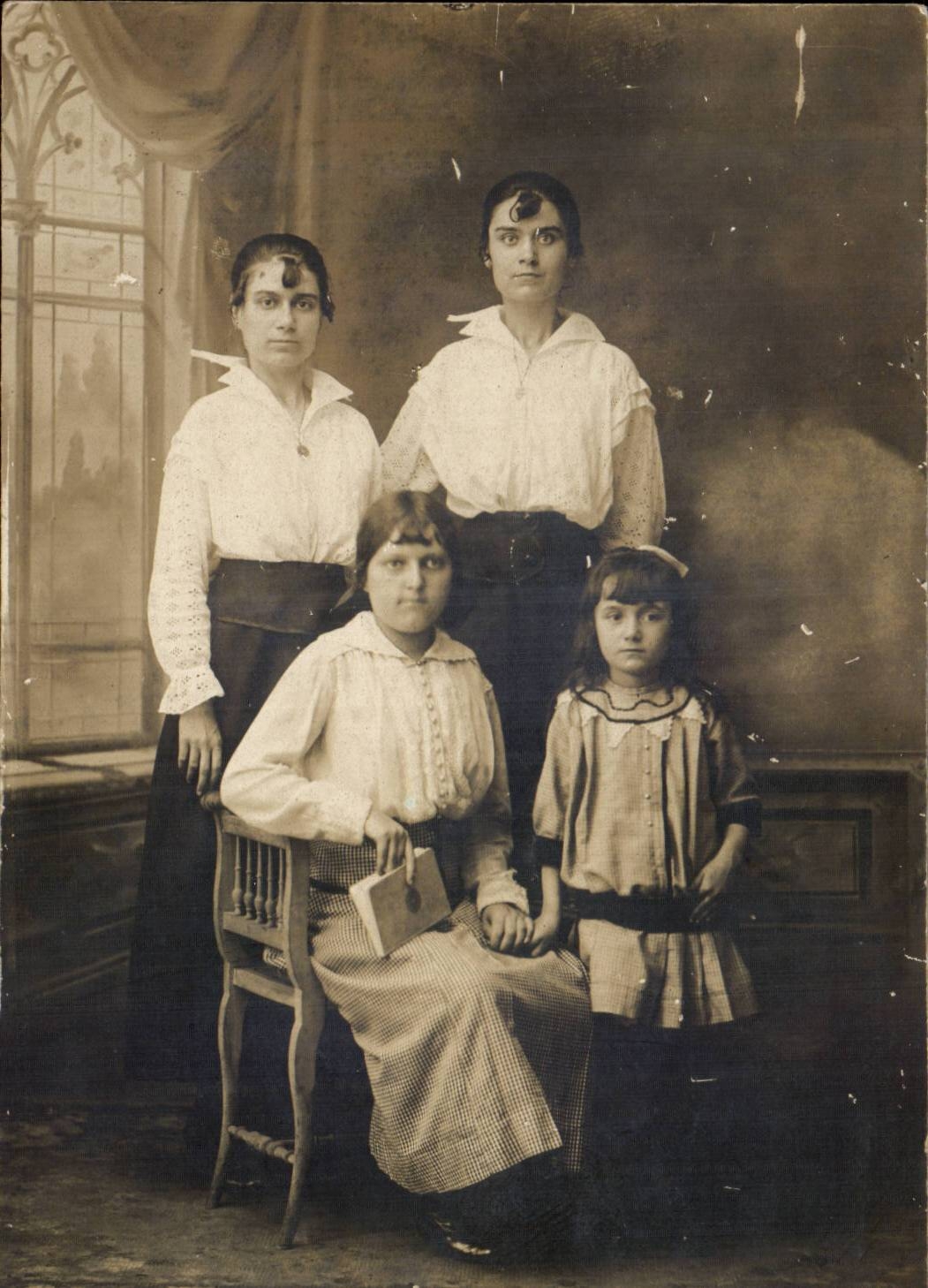 Real photo young women in family (folklore costumes)