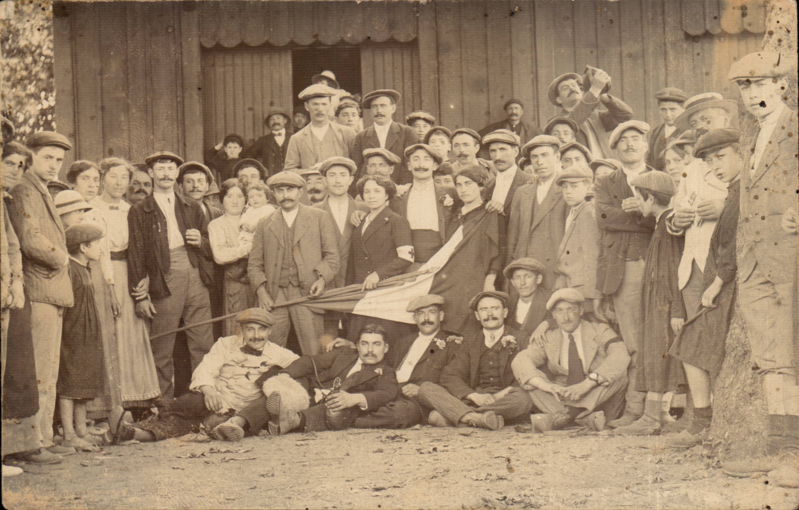 Real photo Group with French flag (folklore costume)