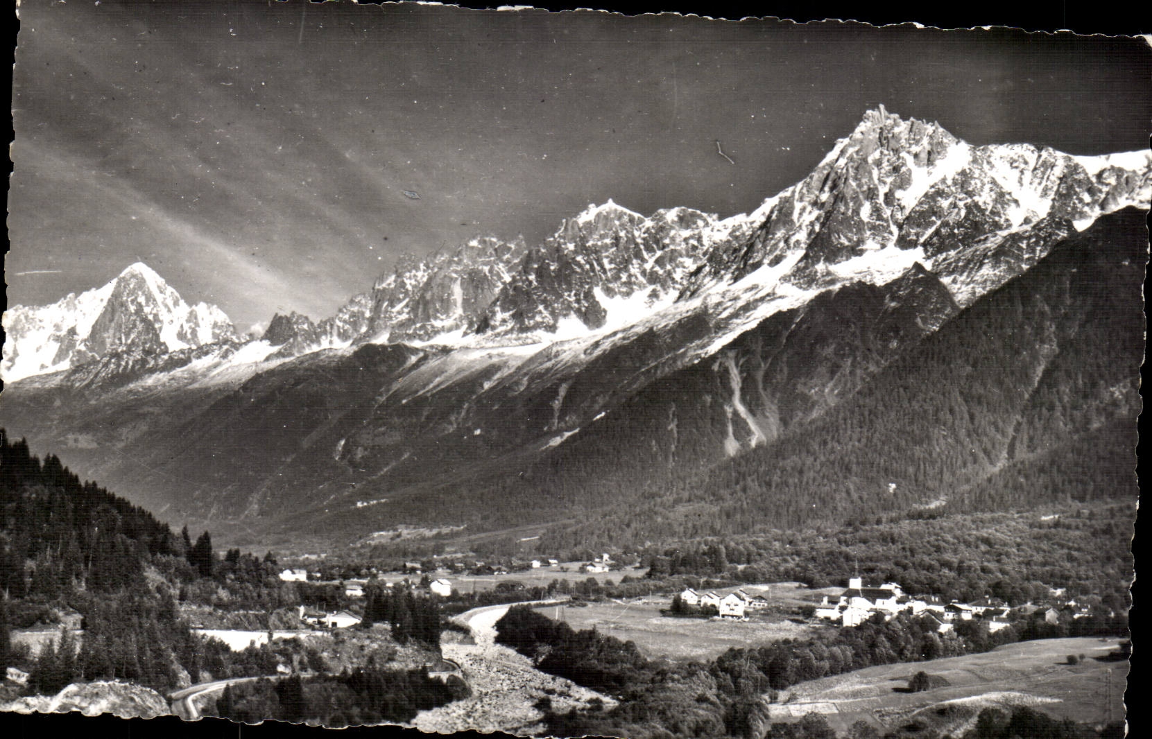Houches CPA the valley of the arve and chains it needles of the solid mass of Mont Blanc