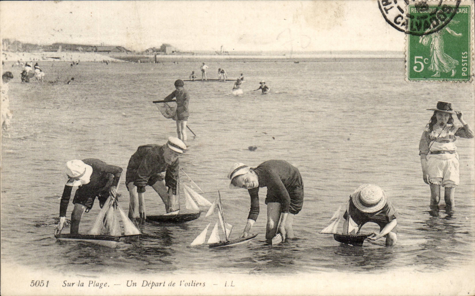 CPA On the beach a departure of sailing ships