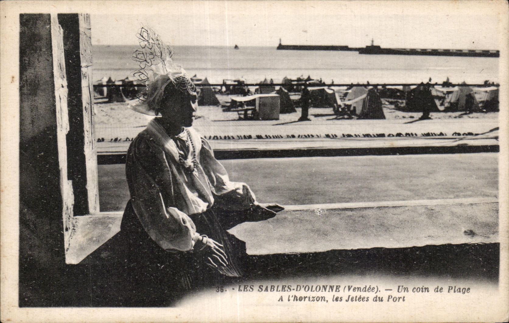 CPA sands Olonne a corner of beach has horizon the piers of the port Coiffe Folklore costume