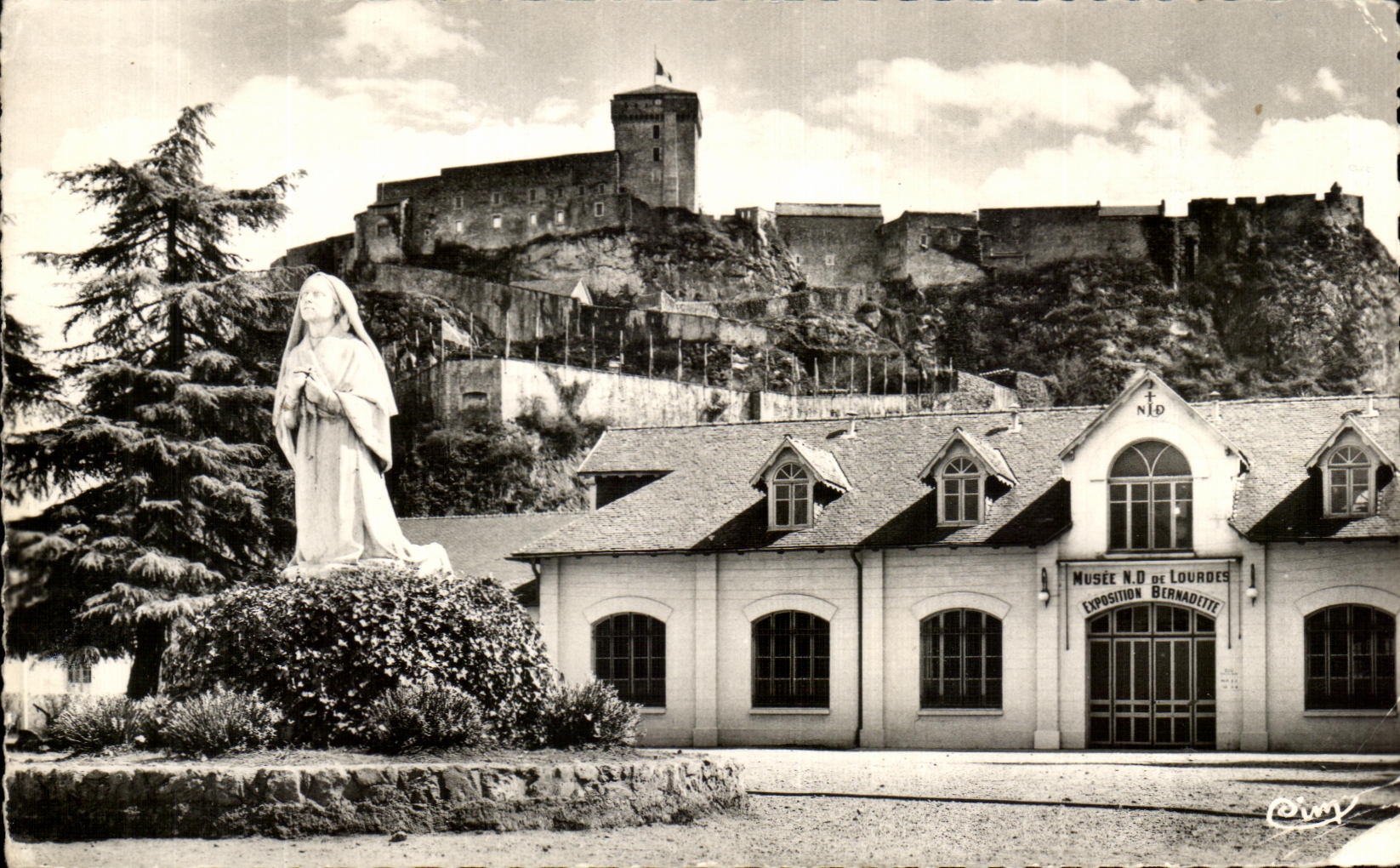 CPA Lourdes Sainte Bernadette the ND Museum of Lourdes and the strong castle