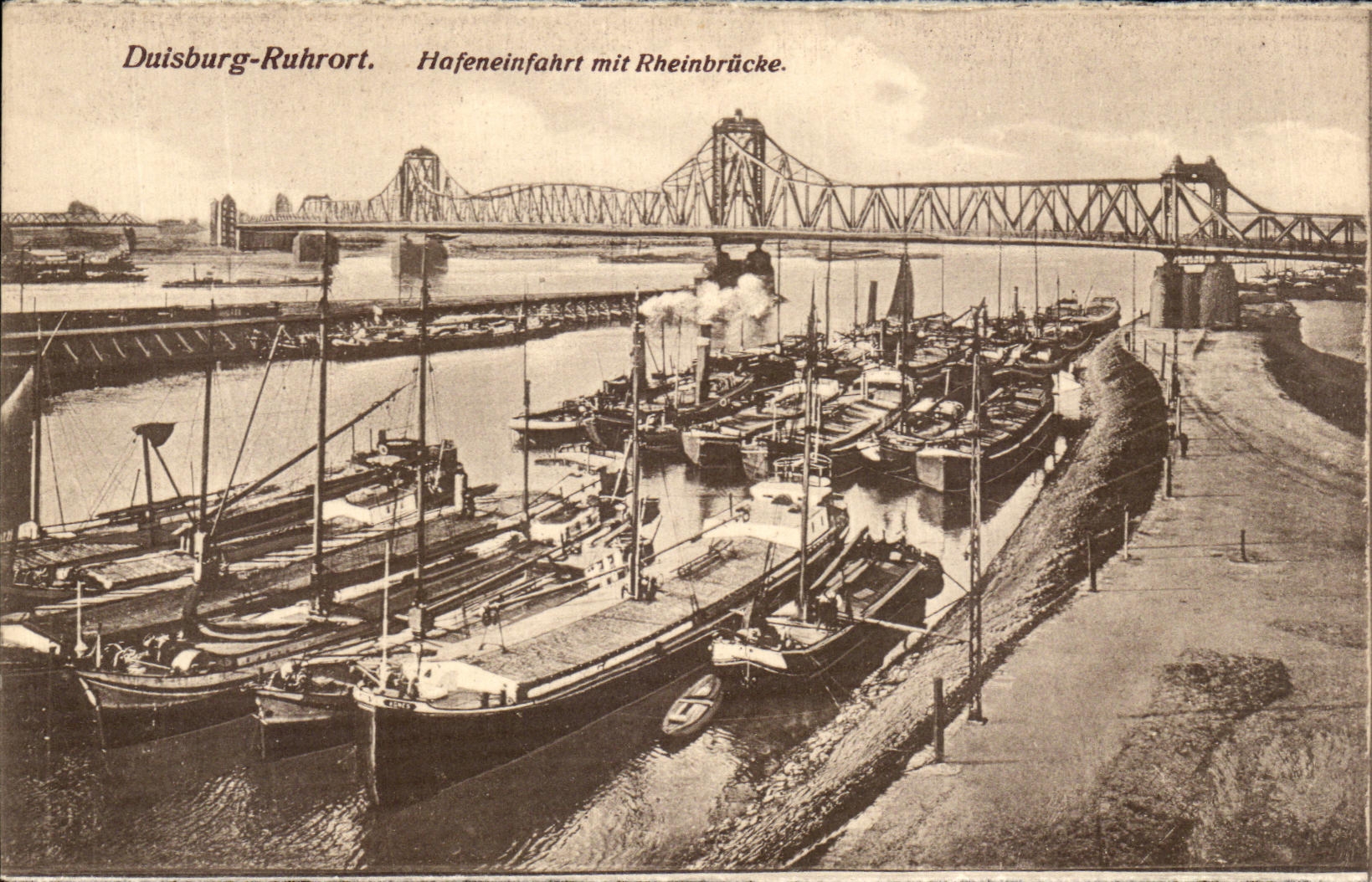VINTAGE POSTCARD Duisburg Ruhrot Hafeneinfahrt MIT Rheinbrucke Boats