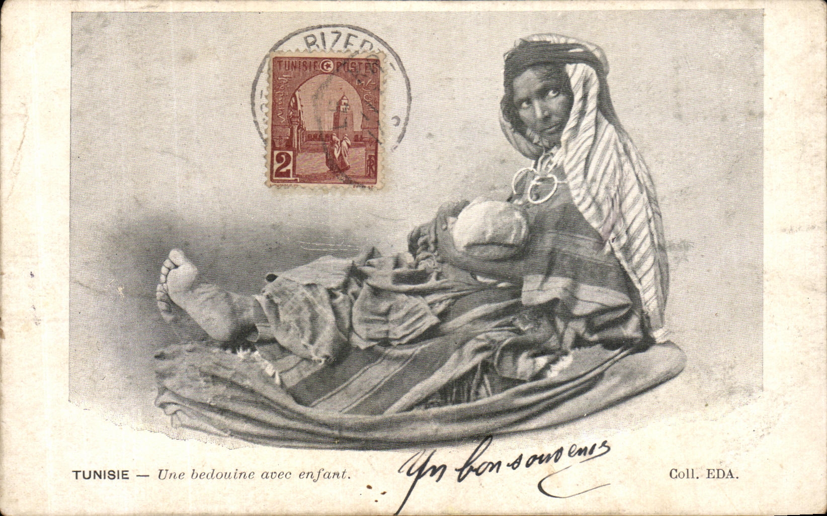 VINTAGE POSTCARD Tunisia a Bedouin with a child