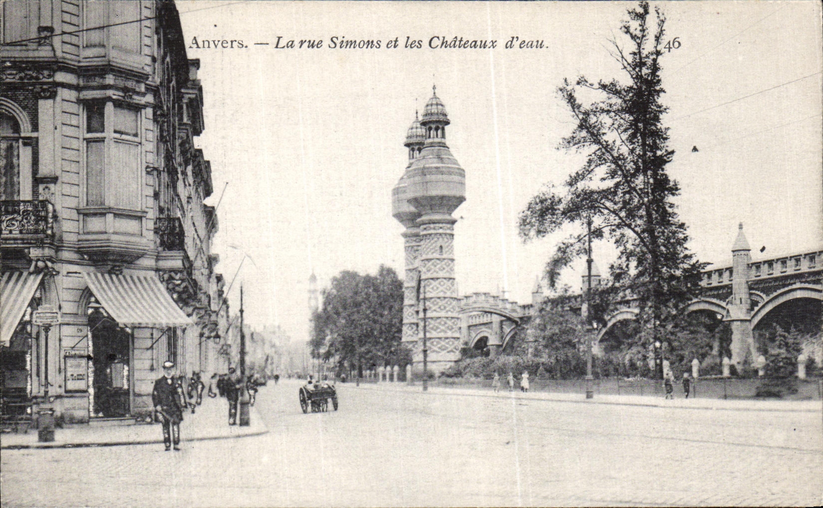 La POSTAL Amberes de la VENDIMIA la calle Simons y los castillos D riega