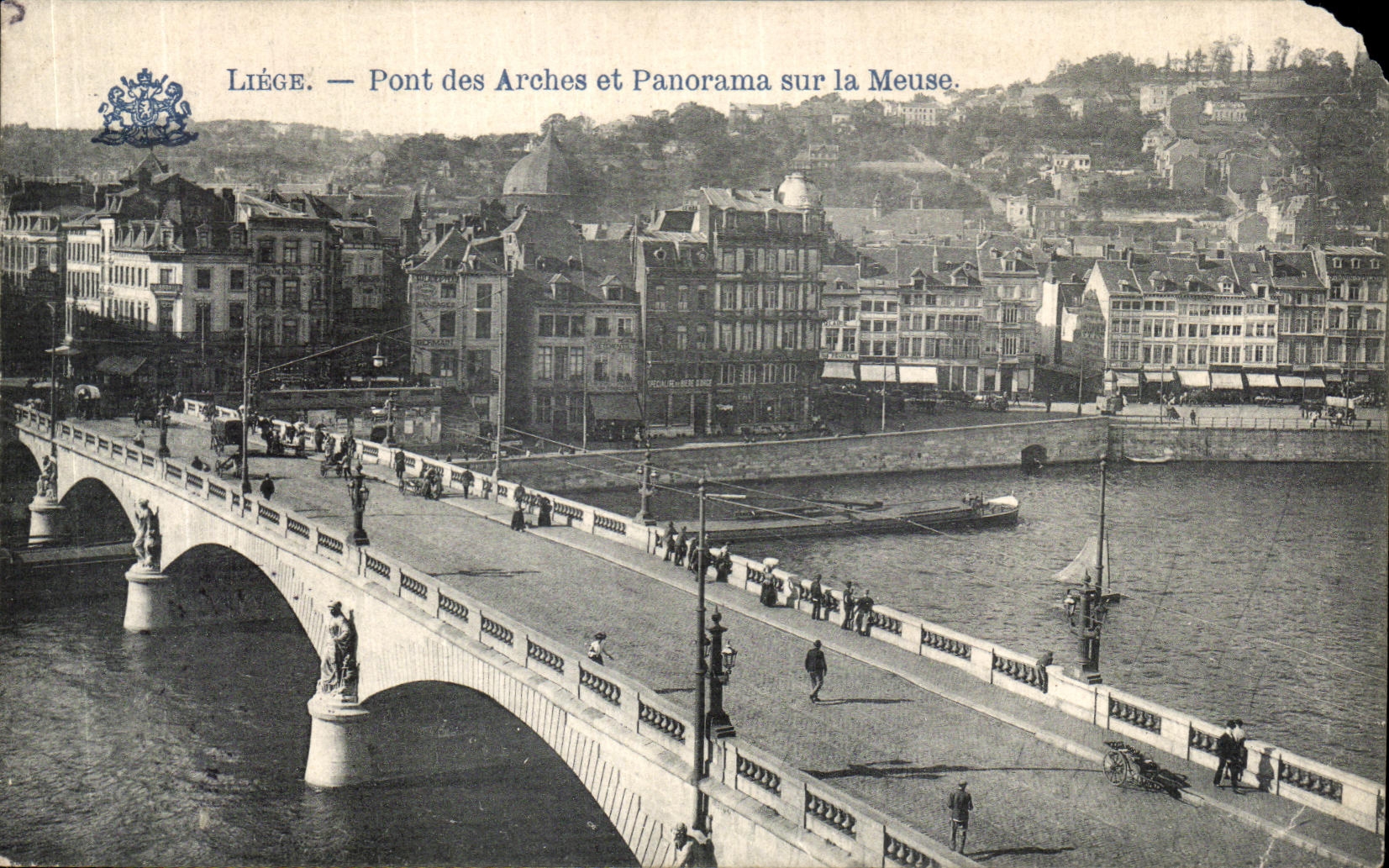 Puente de Lieja de la POSTAL de la VENDIMIA de los arcos y del panorama en la Mosa