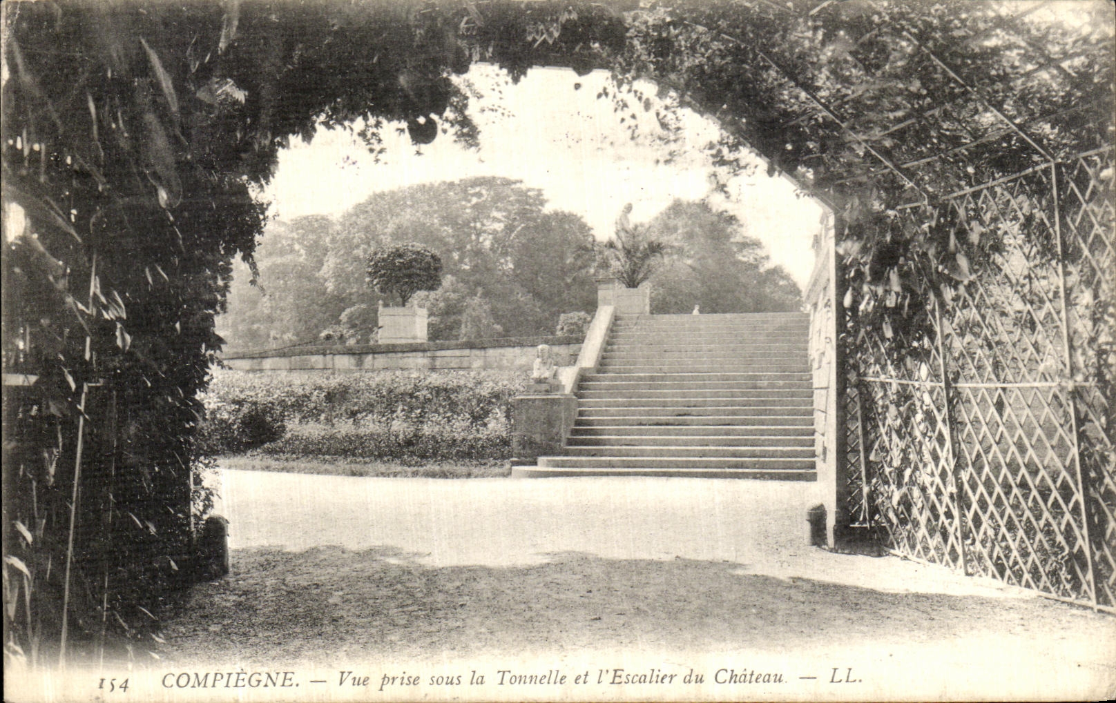 VINTAGE POSTCARD Compiegne Seen from under the Arbor and L Staircase of the Castle