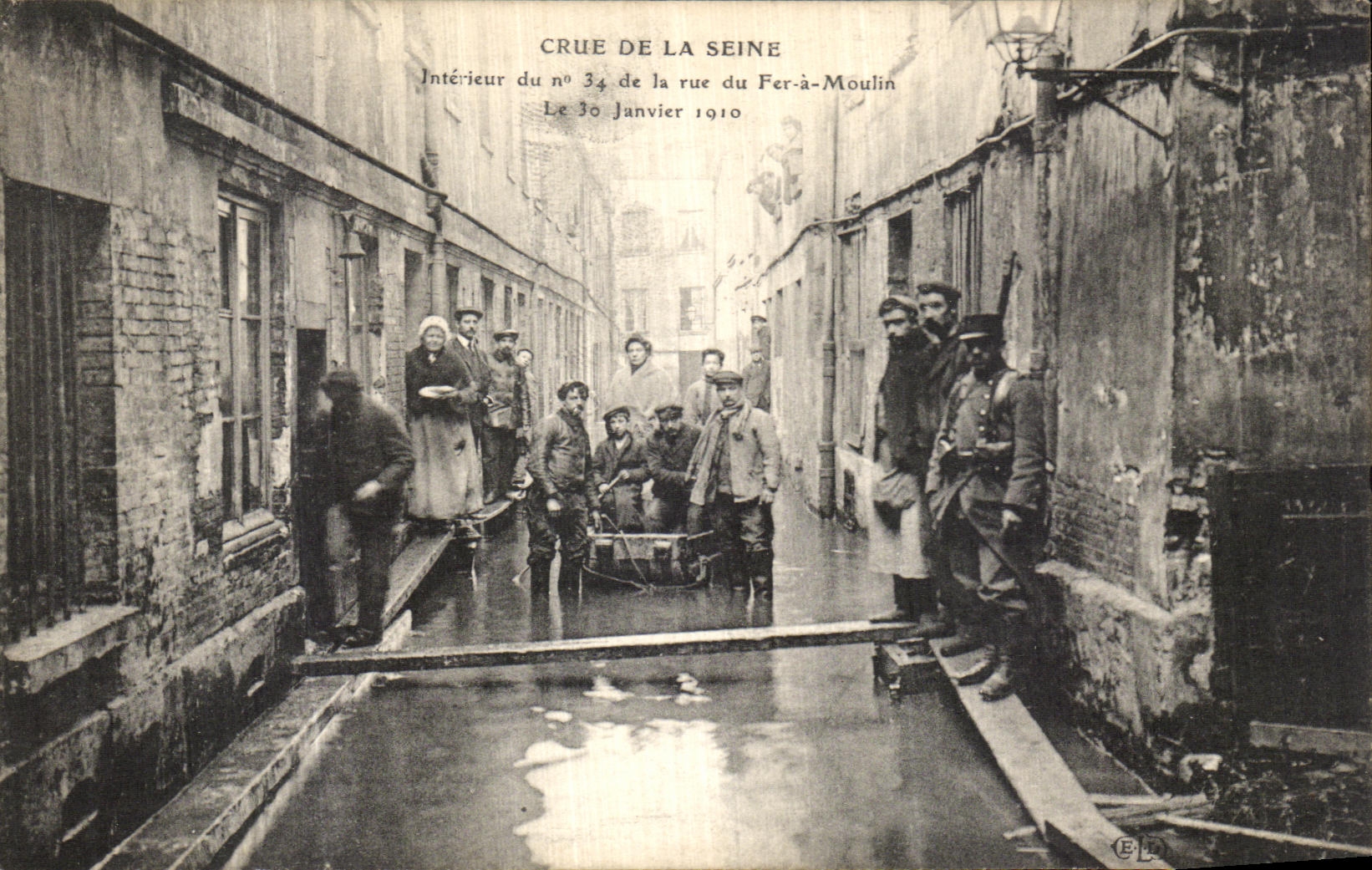 VINTAGE POSTCARD the Rising Of the Seine Interieur of the Iron Street has Moulin