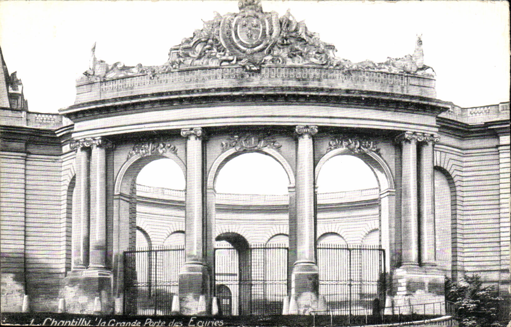 VINTAGE POSTCARD Chantilly the large door of the stables