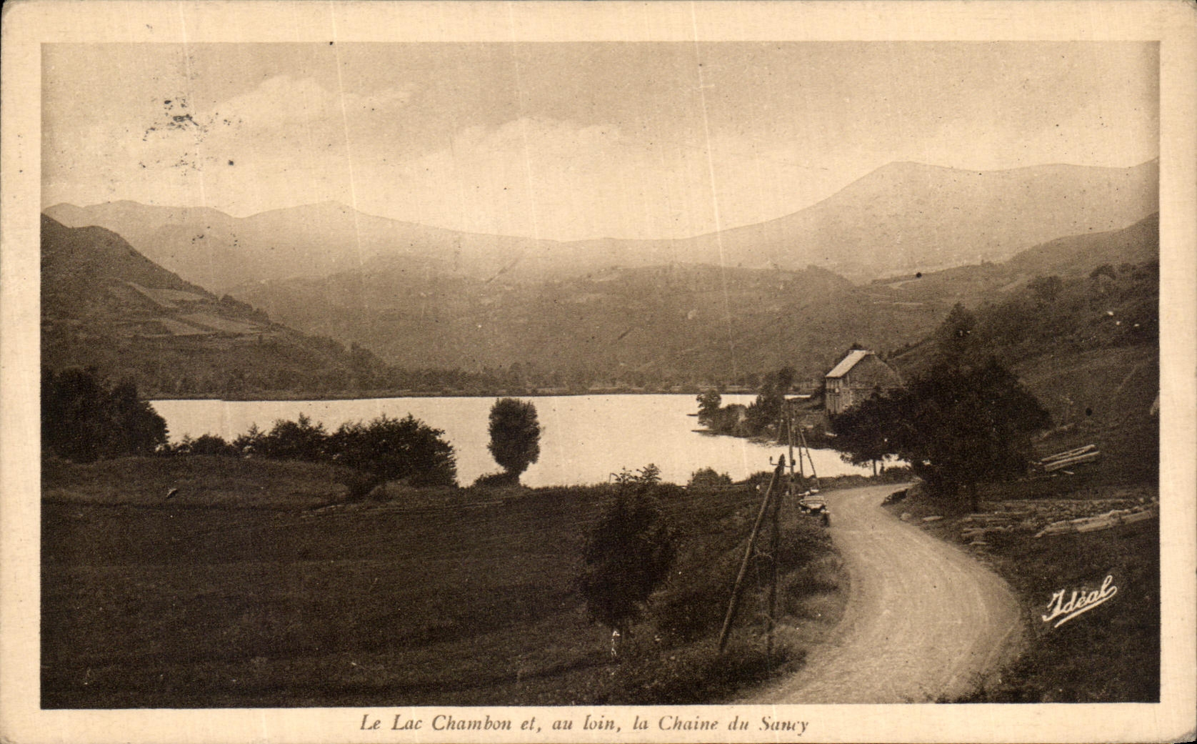 VINTAGE POSTCARD the Lake Chambon And With Far the Chain from Sancy