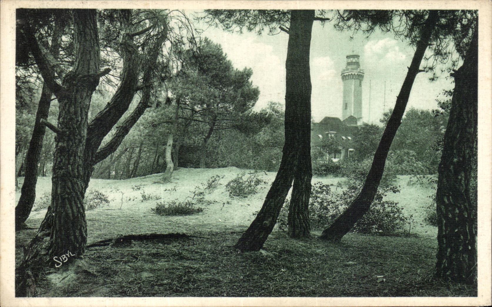 Playa de Touquet Paris de la POSTAL de la VENDIMIA el faro a traves del taladro
