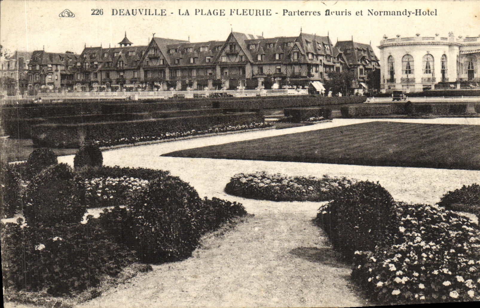 La POSTAL Deauville de la VENDIMIA la playa florecida florecio pisos y el hotel de Normandia