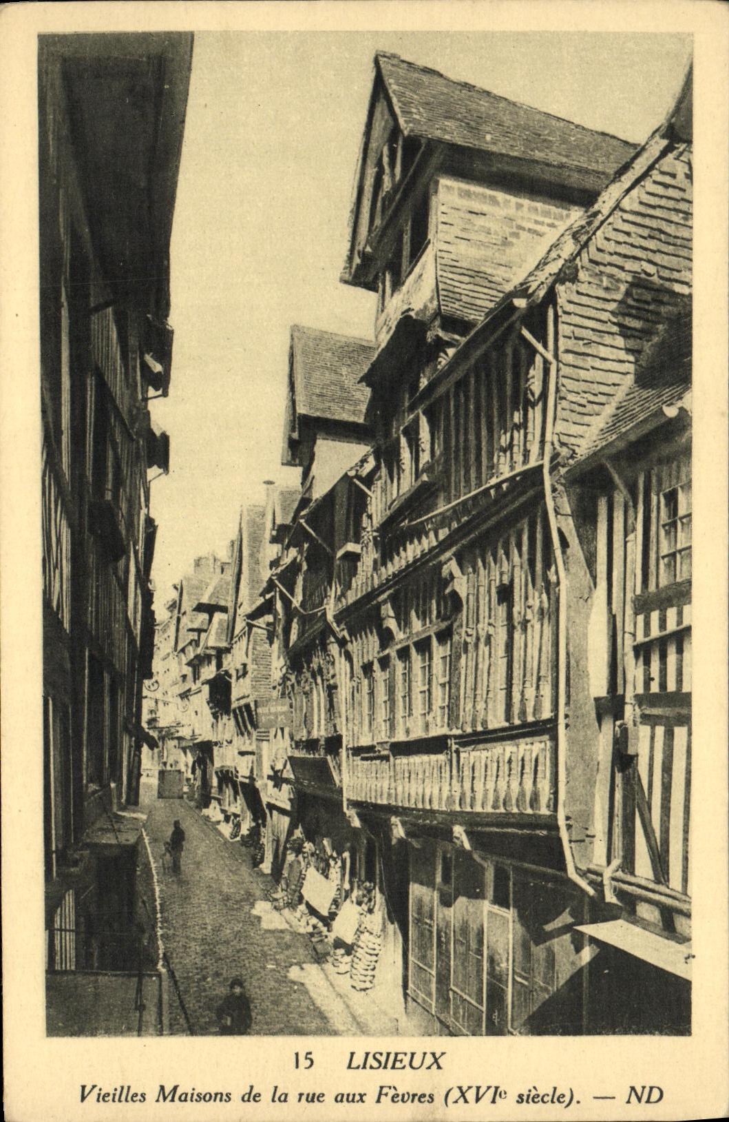 VINTAGE POSTCARD Lisieux Old women Houses of the Street to the Boilermen