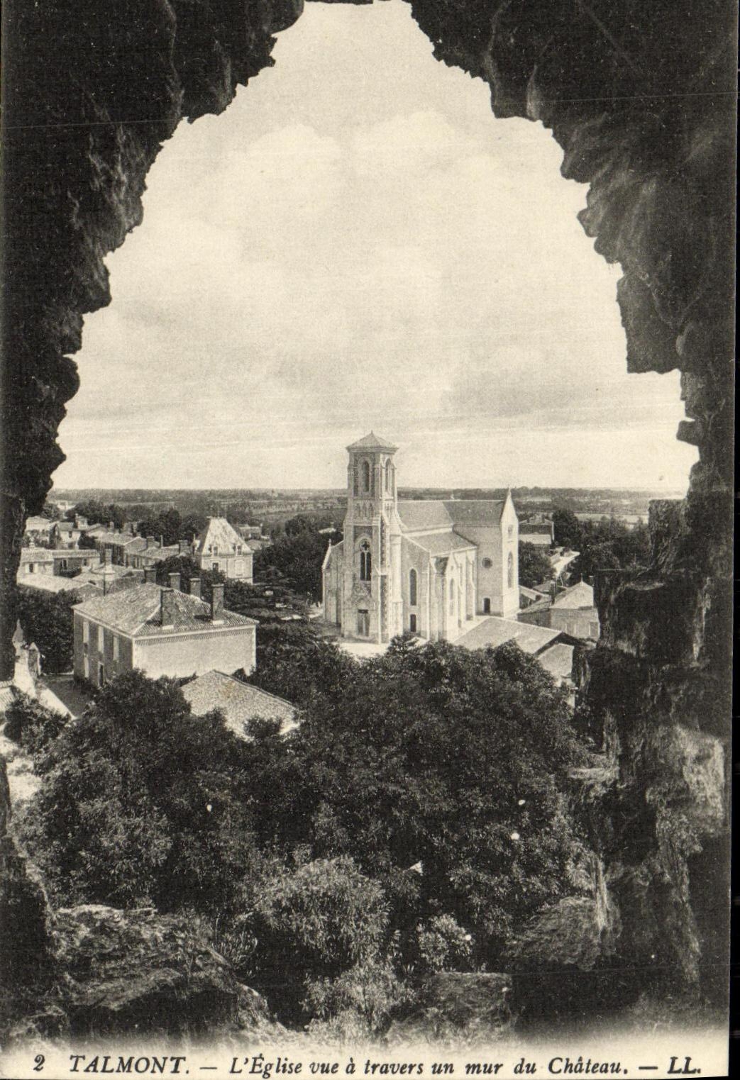 VINTAGE POSTCARD Talmont L Church uve through a wall of the Castle