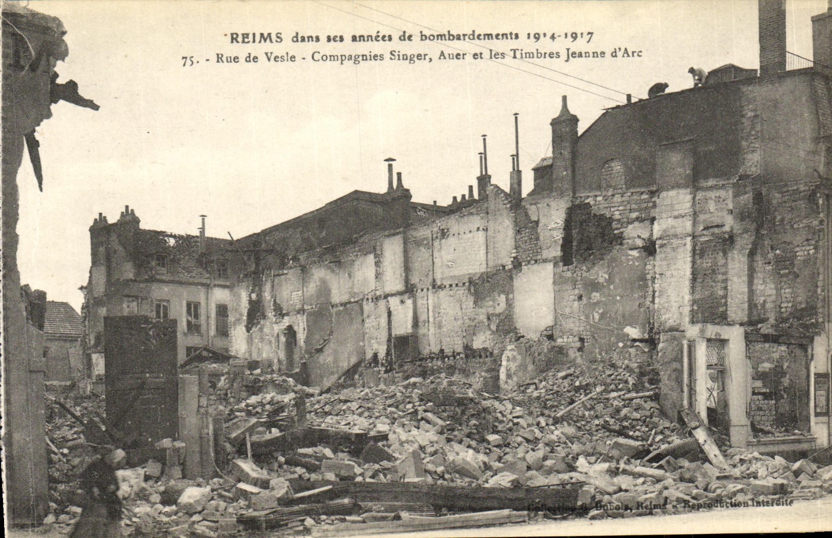 VINTAGE POSTCARD Rheims In its years of Bombardments Street of Vesle Companies Singer Auer and the stamps Jeanne D arc