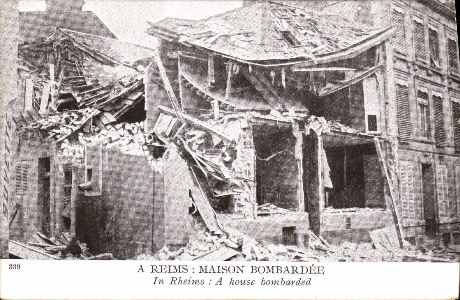 VINTAGE POSTCARD Militaria has Rheims Maison Bombardee
