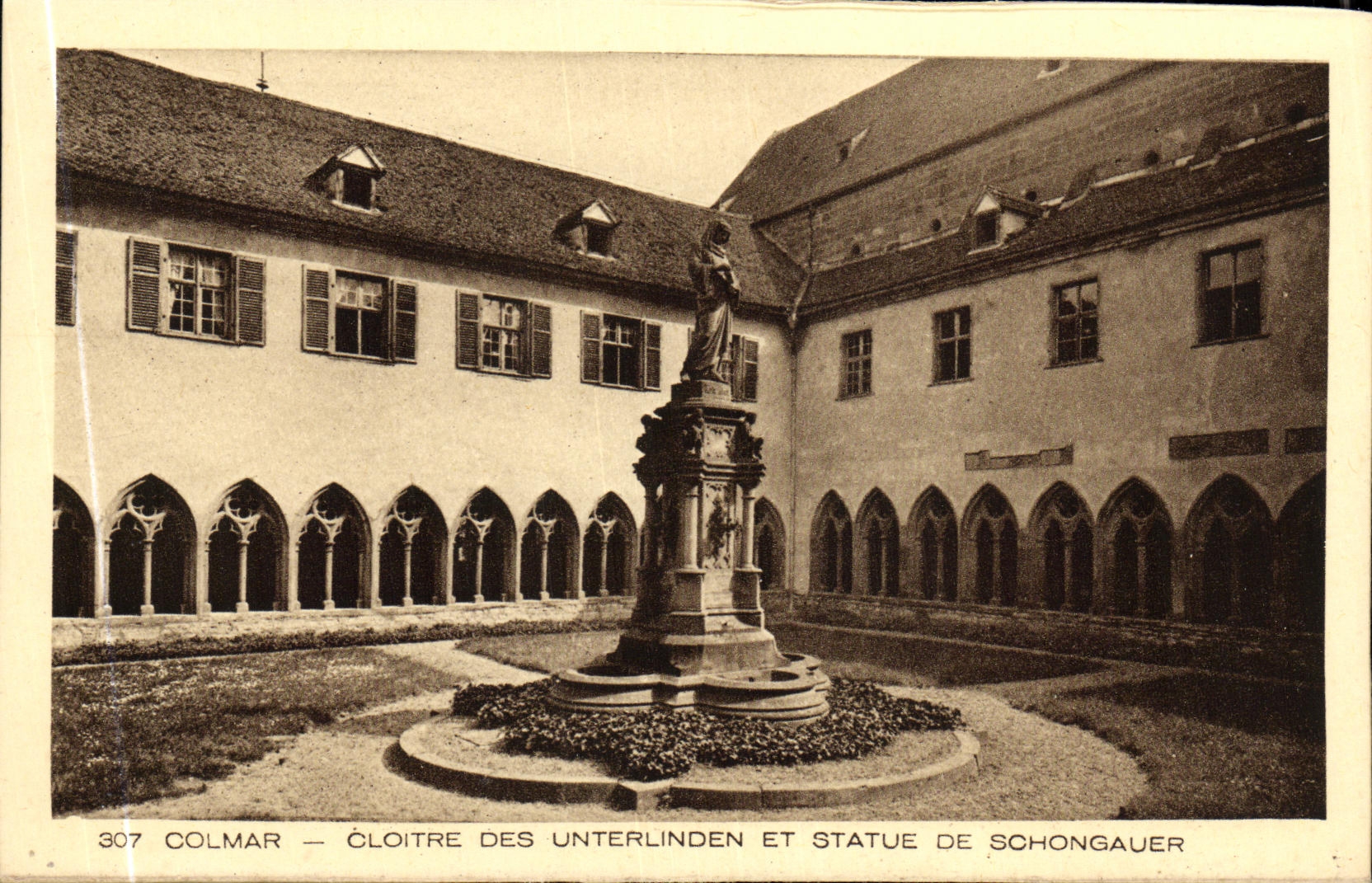 Claustro de Colmar de la POSTAL de la VENDIMIA de Unterlinden y estatua de Schongauer