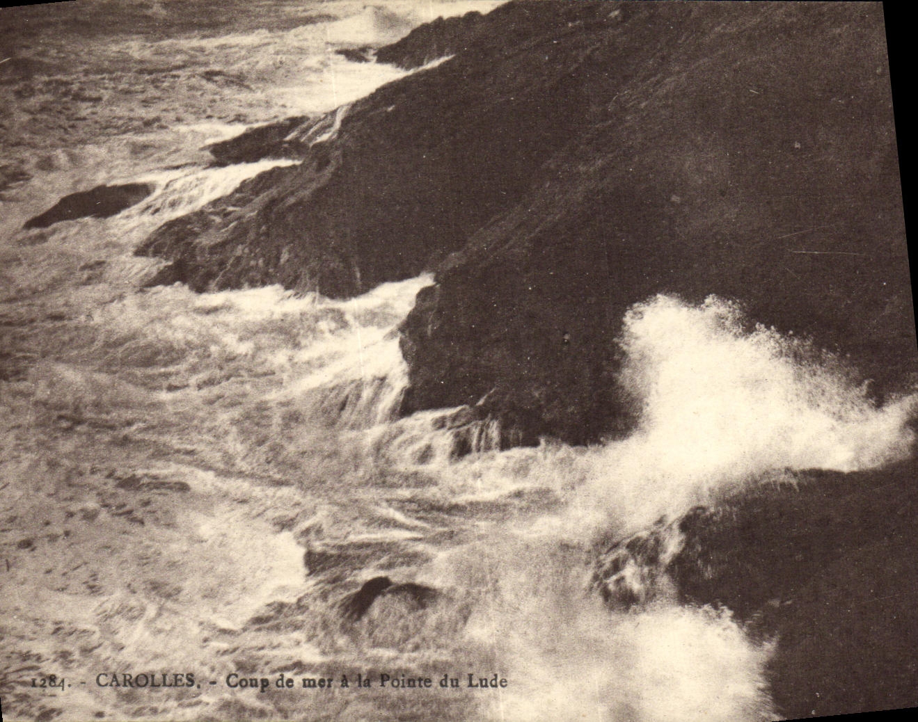VINTAGE POSTCARD Carolles Heavy swell to the point of Lude