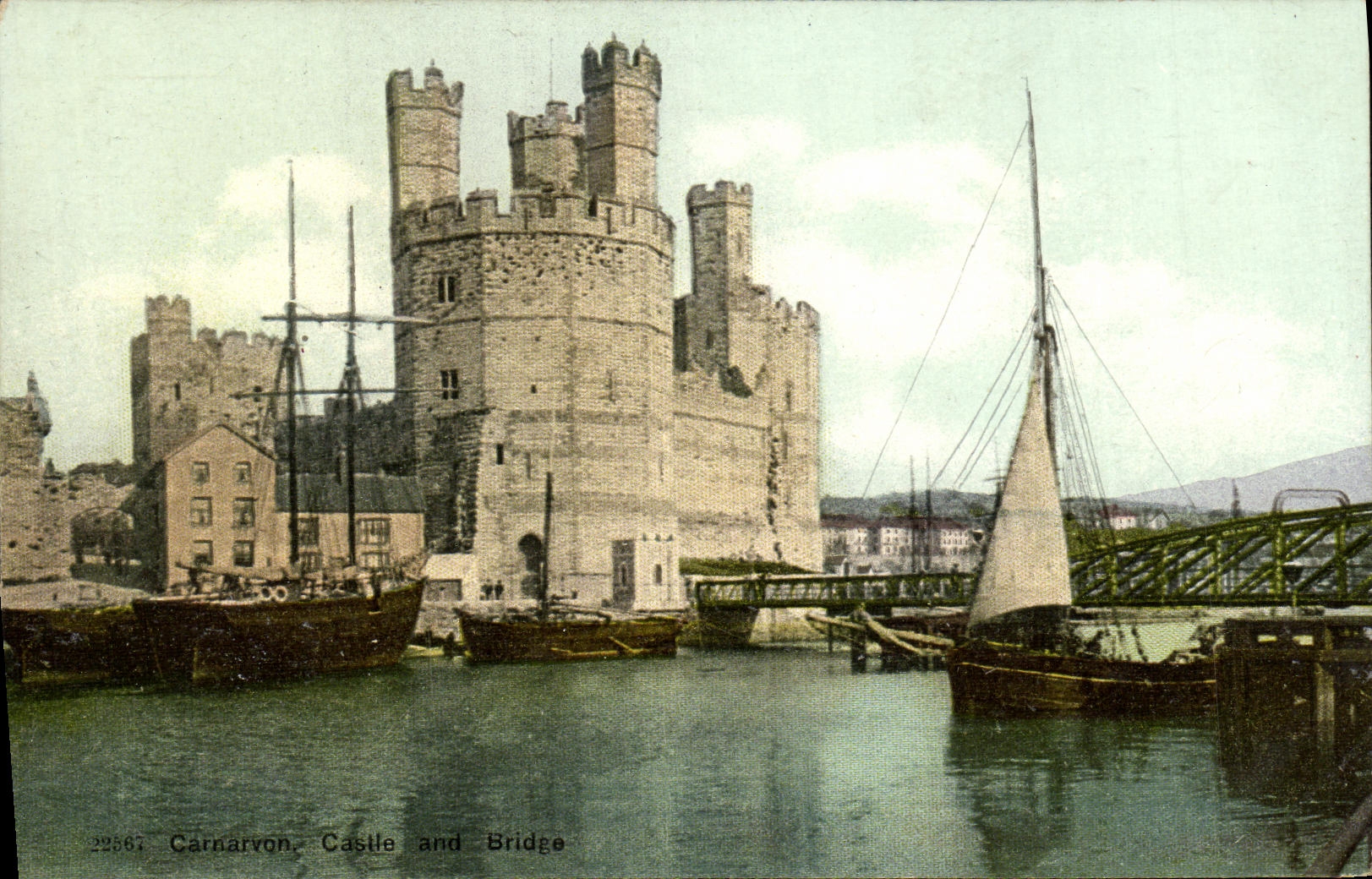 VINTAGE POSTCARD Carnavon Castle and bridge Boat
