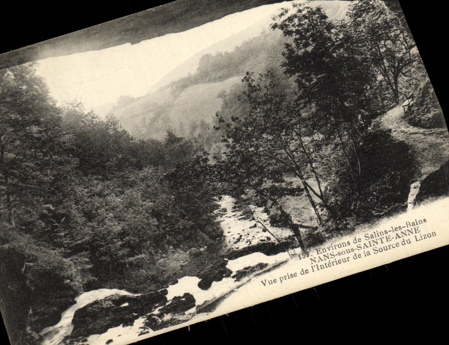 VINTAGE POSTCARD Surroundings Saline les Bains Nans under Sainte Anne Seen from of L Interior of the Source of Lizon