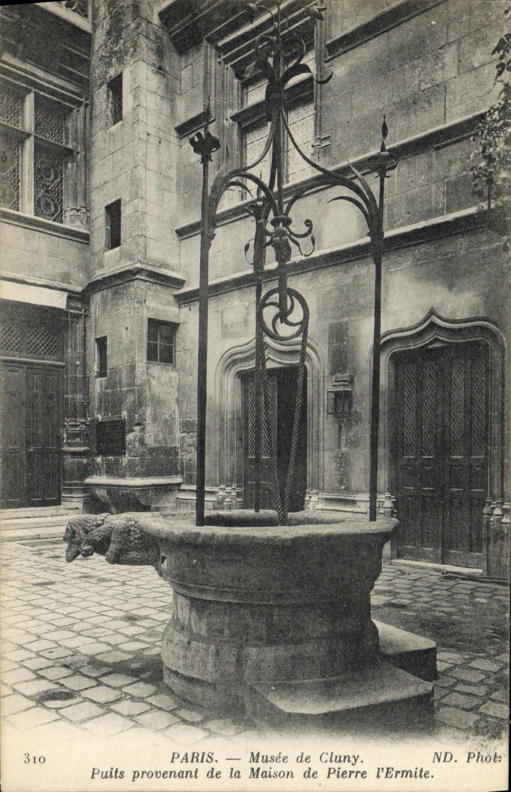 VINTAGE POSTCARD Paris Museum of Cluny Well Coming from the Stone built house L Hermit