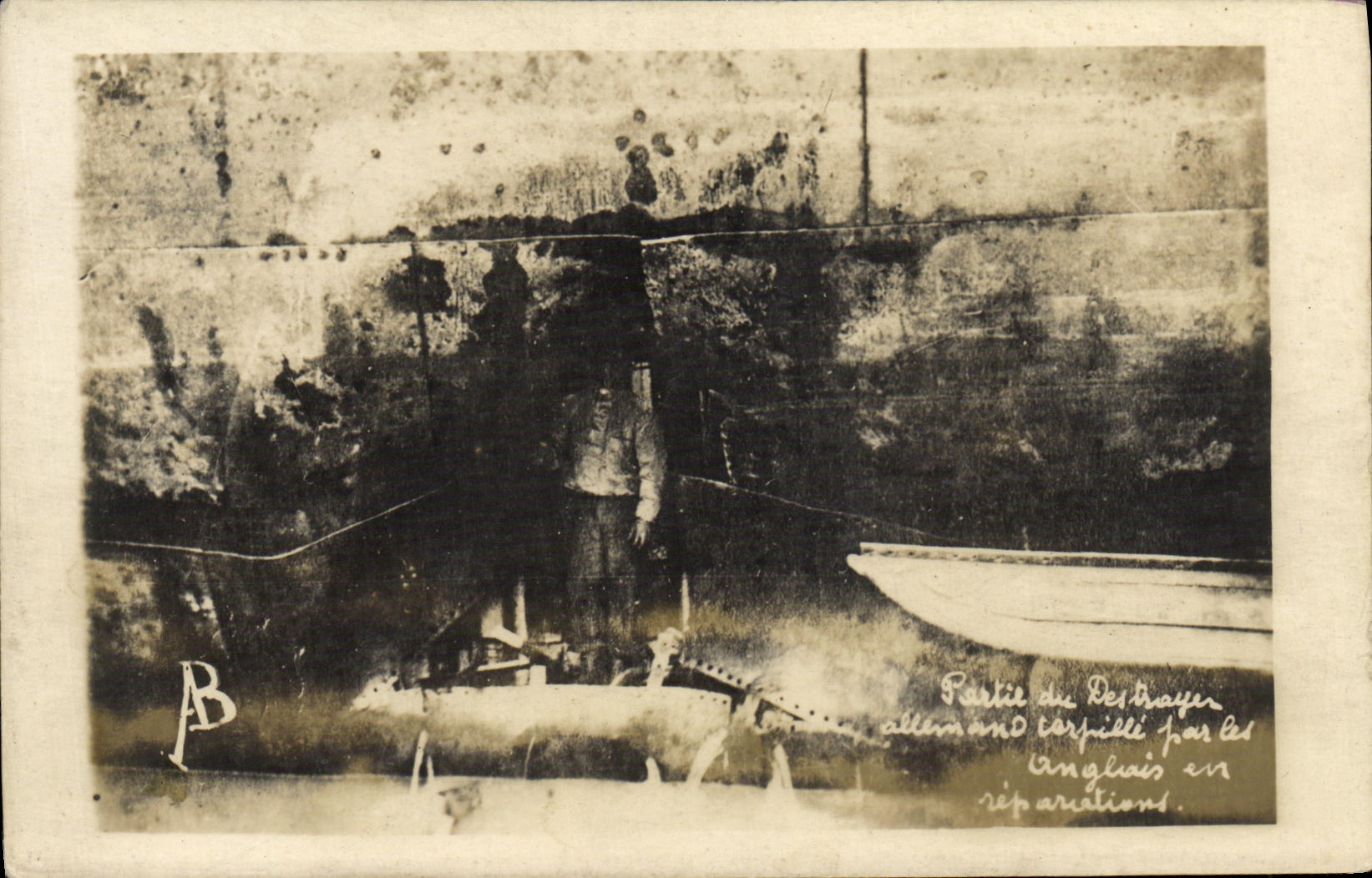 Real photo Partie of the German destroyer torpedoes by English in repairs