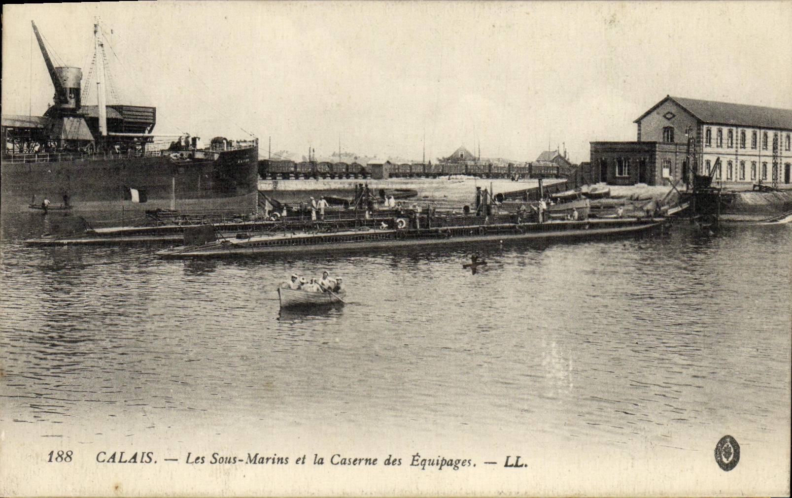 VINTAGE POSTCARD Boat Calais War submarines and the barracks of the crews