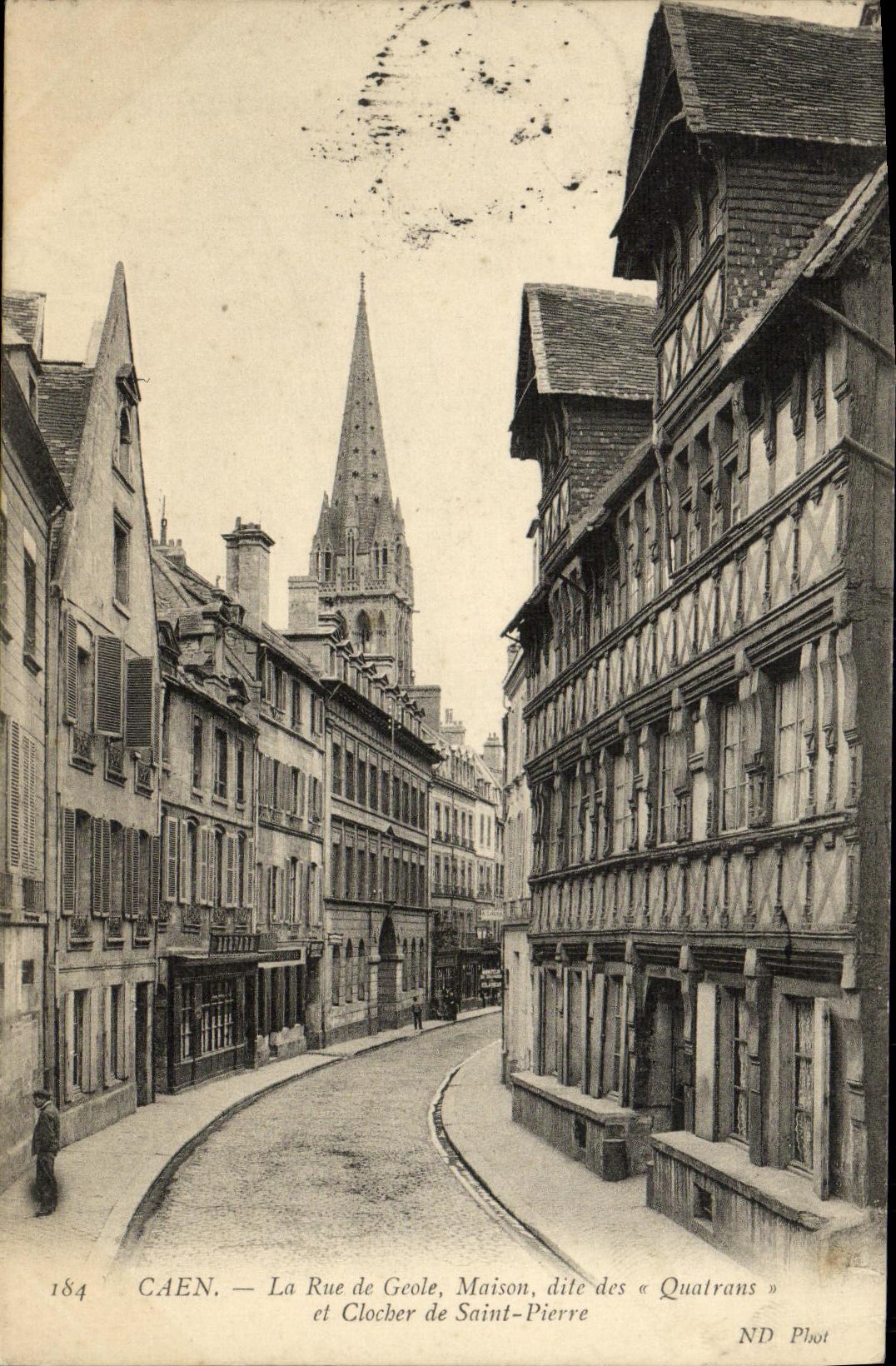 VINTAGE POSTCARD Caen the Street of Jail House known as of Quatrans and bell tower of Saint Pierre