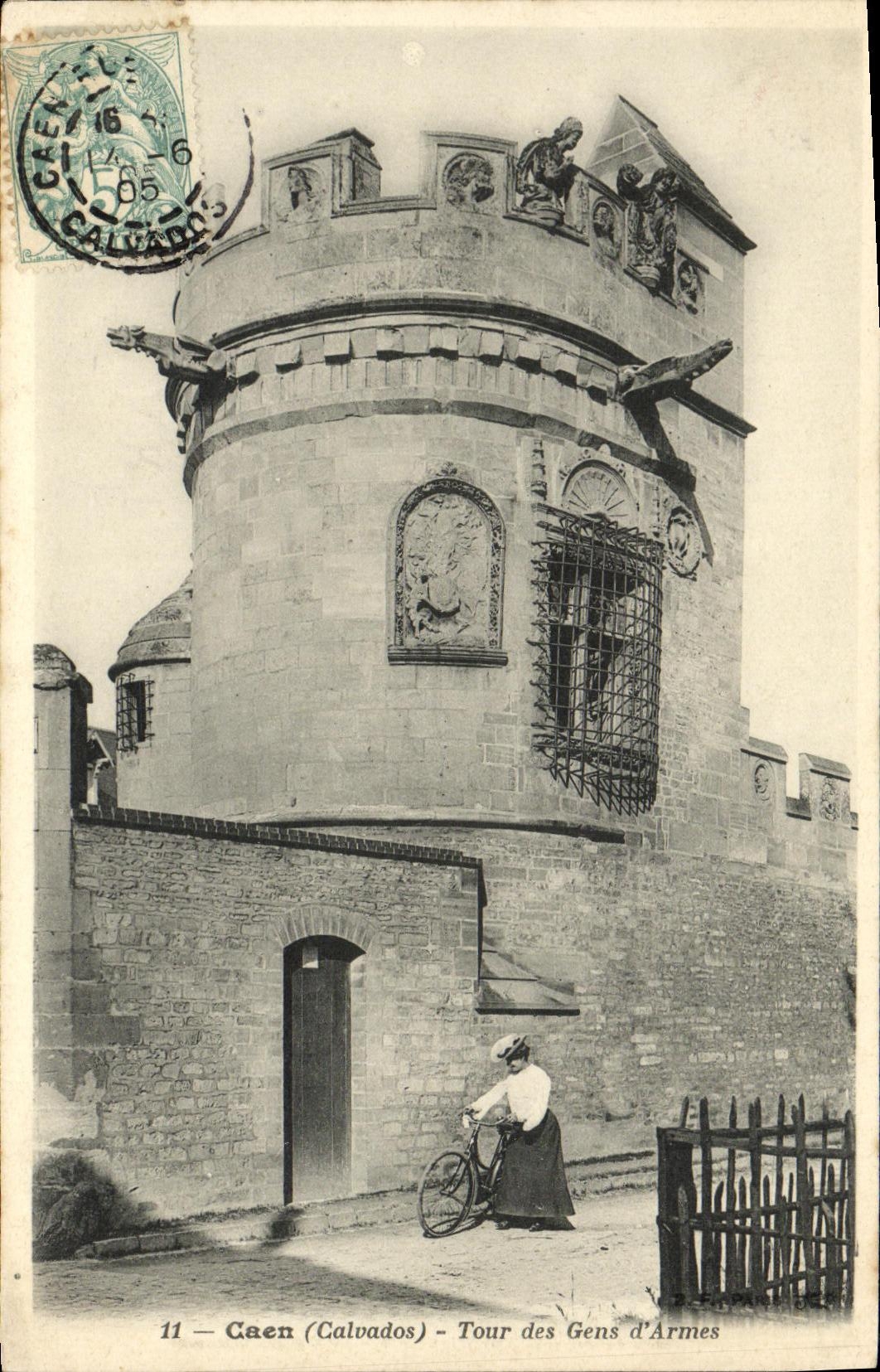VINTAGE POSTCARD Caen the Tower of People D Armes Woman has Cycle bicycle