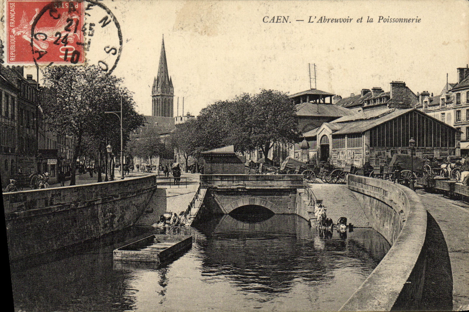 La POSTAL Caen L canal de alimentacion y el pescado de la VENDIMIA hace compras