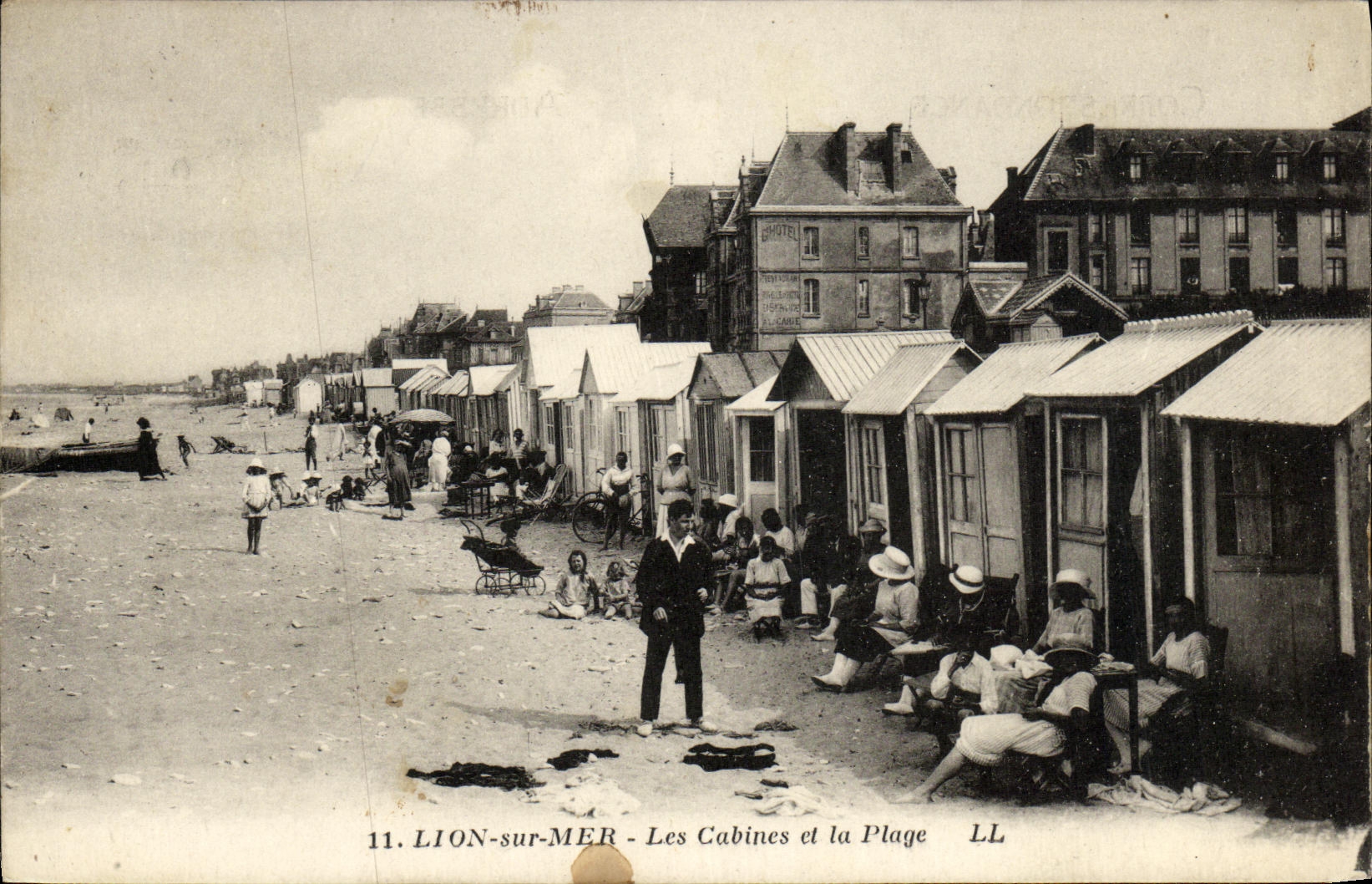 VINTAGE POSTCARD Lion sur Mer Cabins and the Beach
